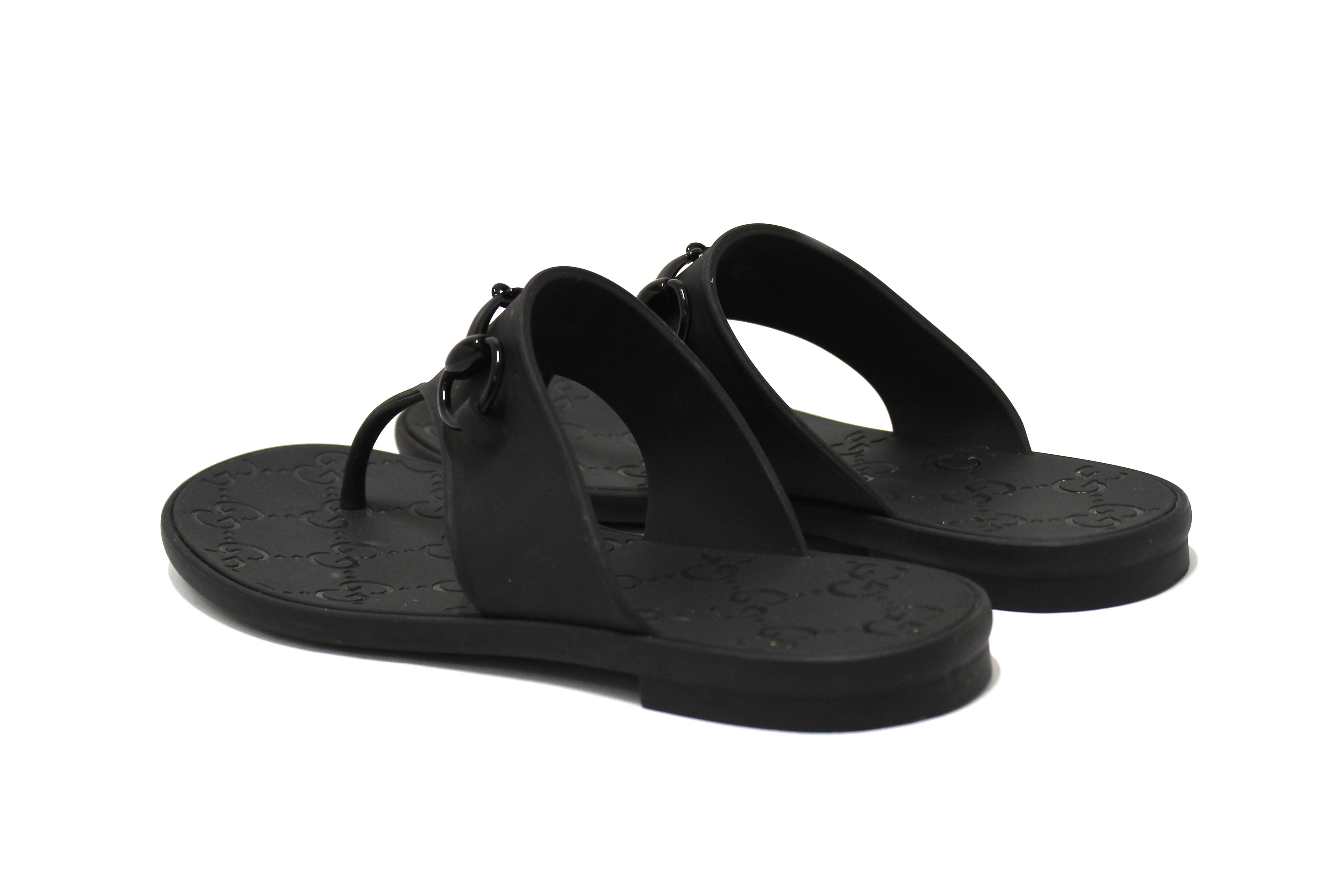 Authentic Gucci Black Minorca Rubber GG Horsebit Thong Sandals size 37