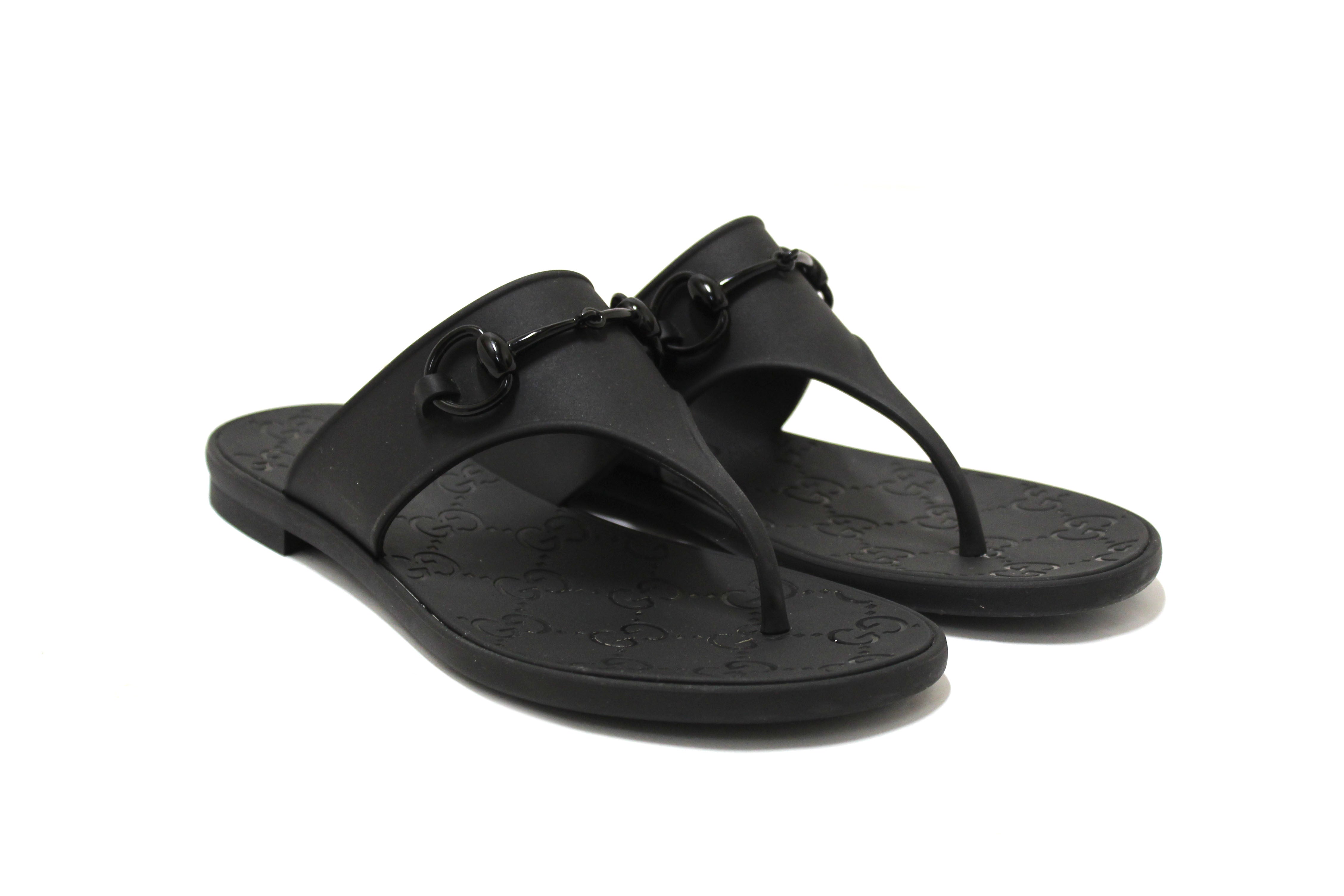 Authentic Gucci Black Minorca Rubber GG Horsebit Thong Sandals size 37