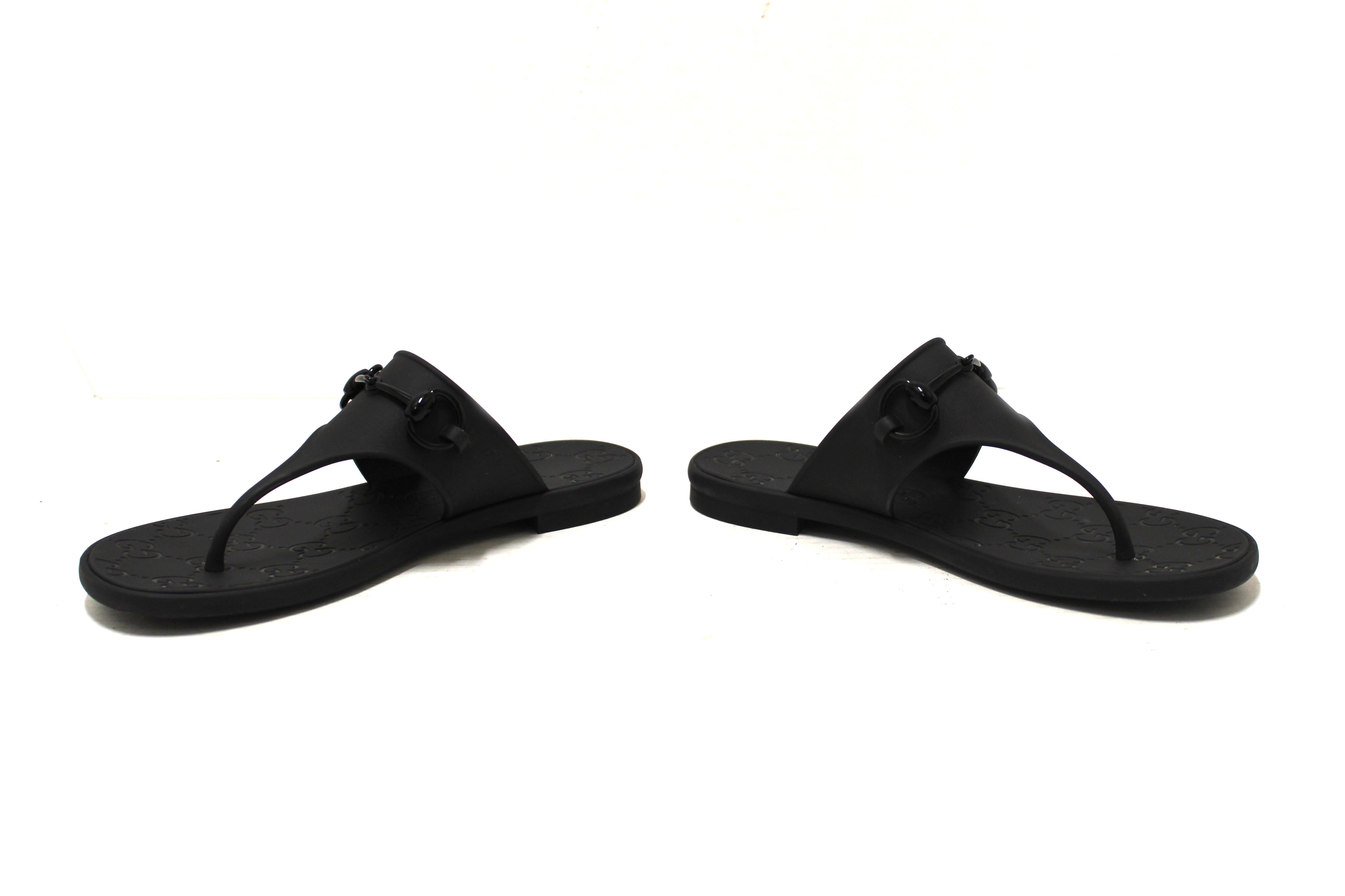 Authentic Gucci Black Minorca Rubber GG Horsebit Thong Sandals size 37