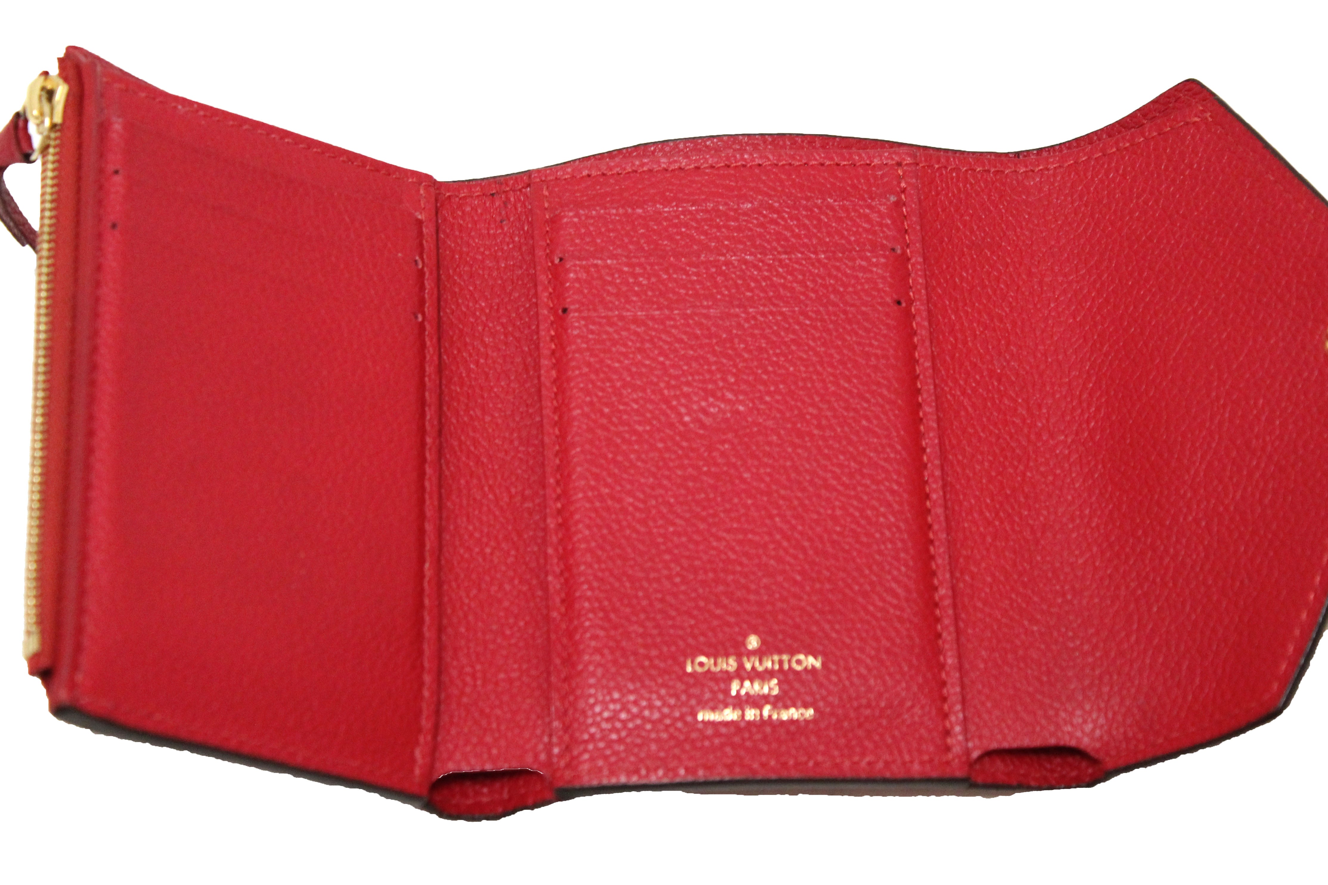 strap monogram empreinte leather wallets