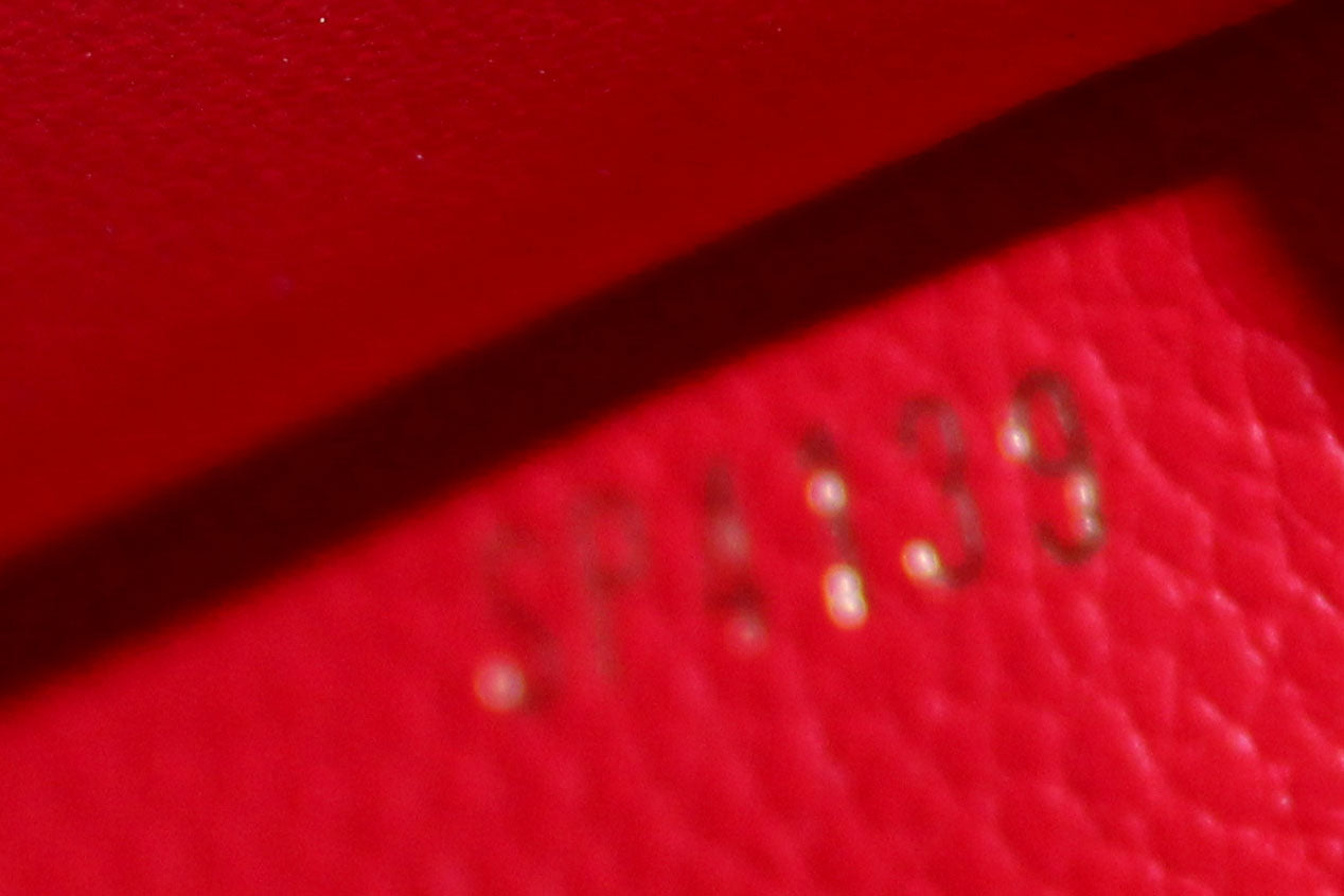 Authentic Louis Vuitton Red Monogram Empreinte Leather Victorine Wallet