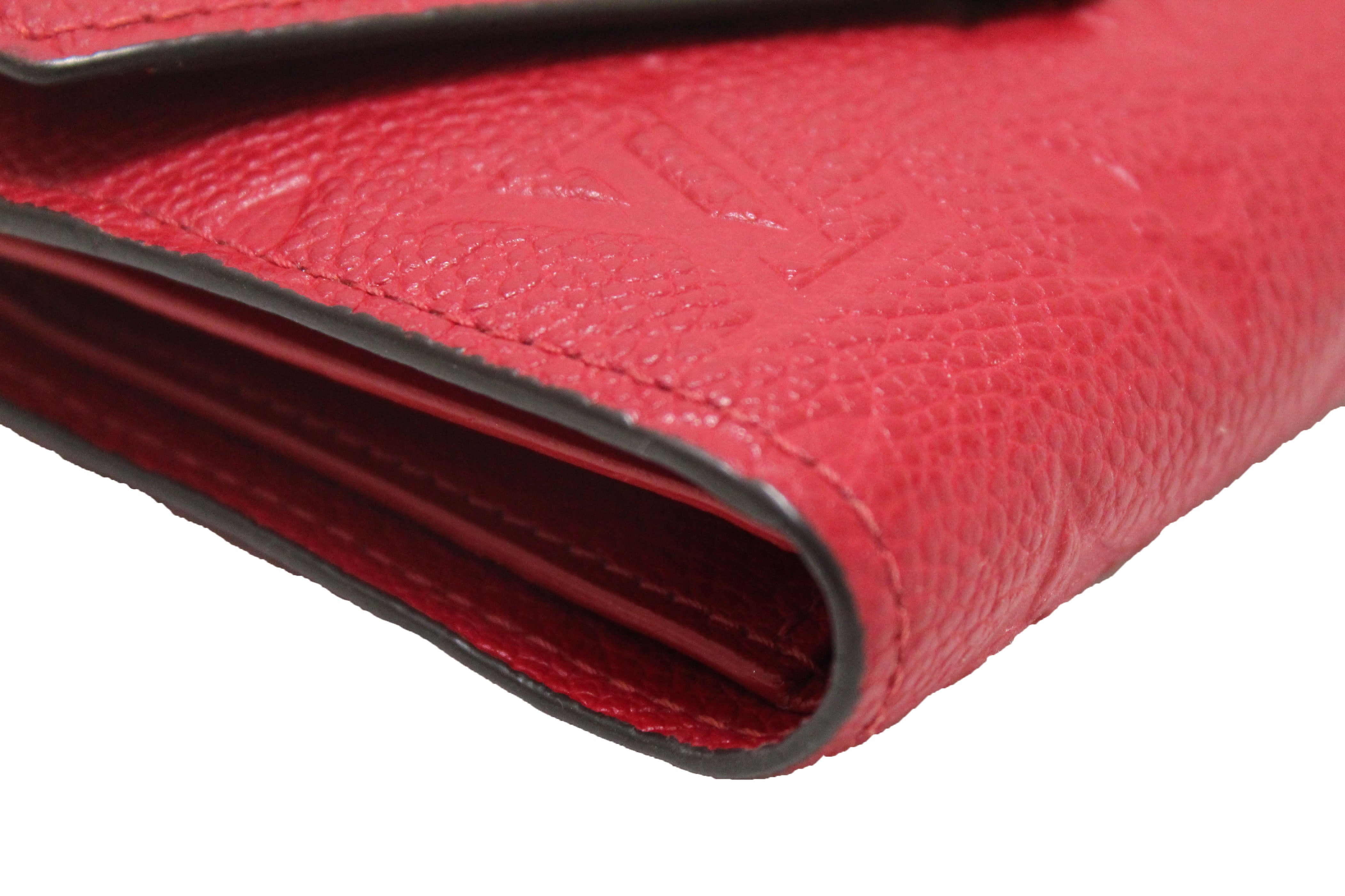 Authentic Louis Vuitton Red Monogram Empreinte Leather Victorine