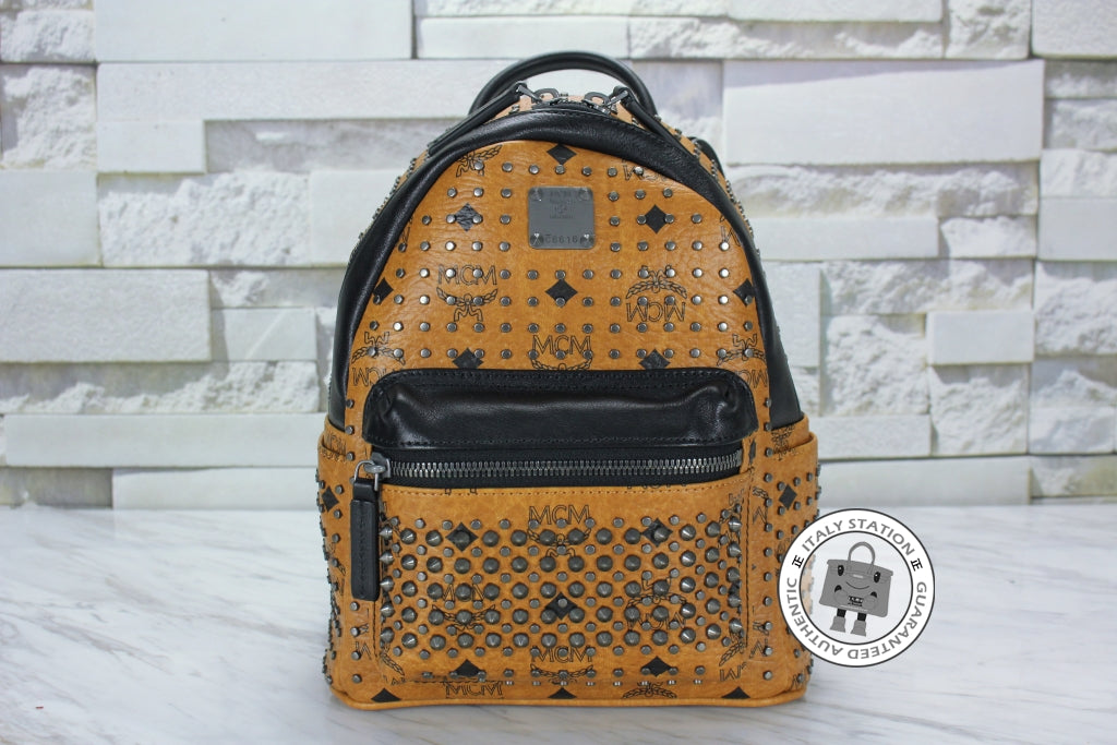MCM Mcm Mmk 5SVE97 Stark Special Cognac / CO001  Pvc Mini Backpacks Sh | Italystation.com - Shop Now at italystation.com