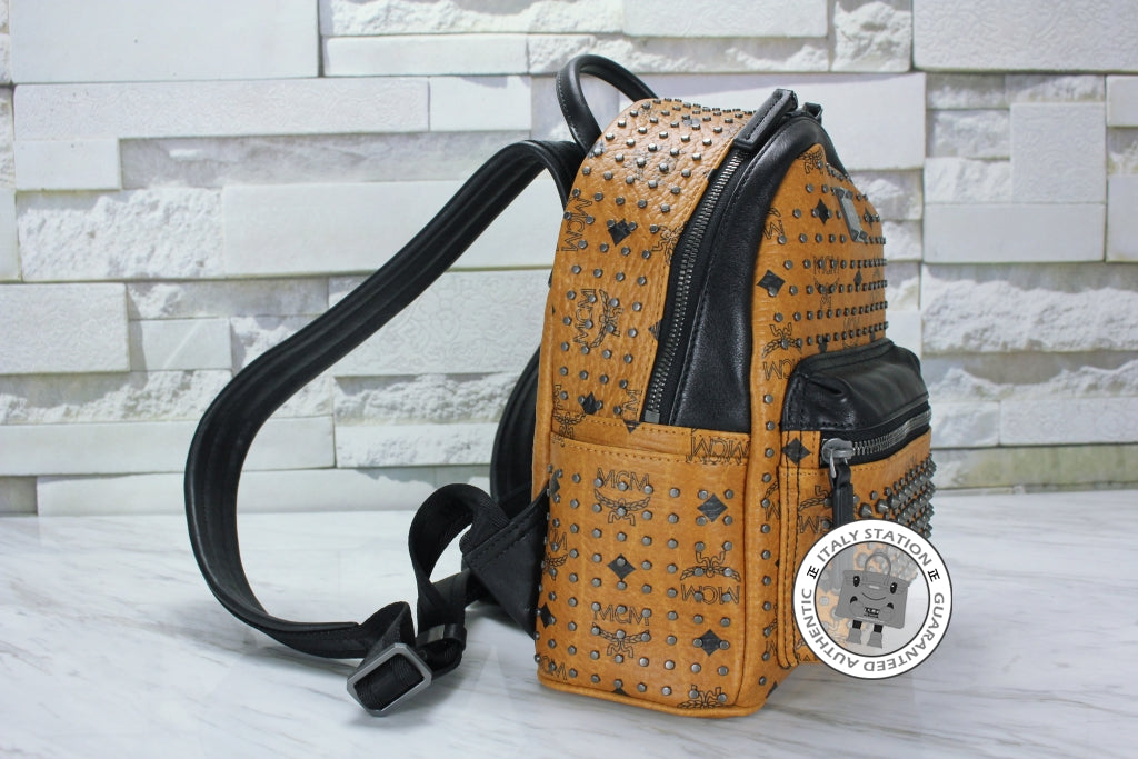 MCM Mcm Mmk 5SVE97 Stark Special Cognac / CO001  Pvc Mini Backpacks Sh | Italystation.com - Shop Now at italystation.com