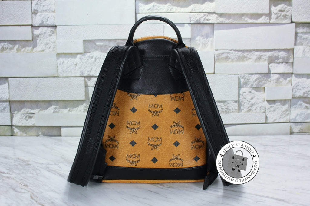 MCM Mcm Mmk 5SVE97 Stark Special Cognac / CO001  Pvc Mini Backpacks Sh | Italystation.com - Shop Now at italystation.com