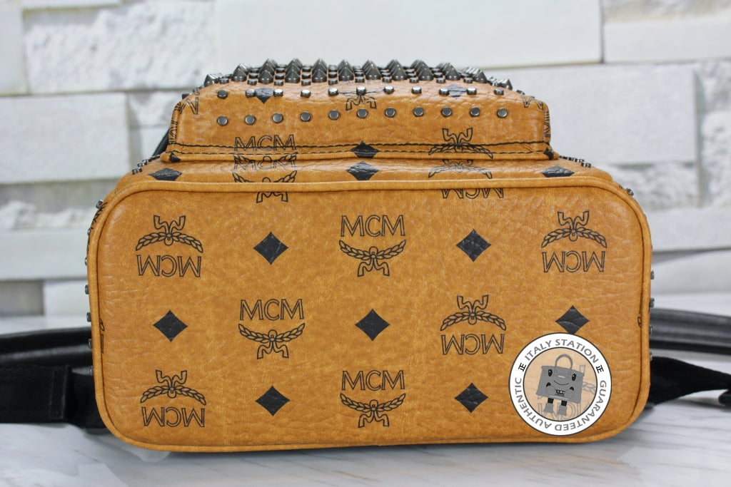 MCM Mcm Mmk 5SVE97 Stark Special Cognac / CO001  Pvc Mini Backpacks Sh | Italystation.com - Shop Now at italystation.com