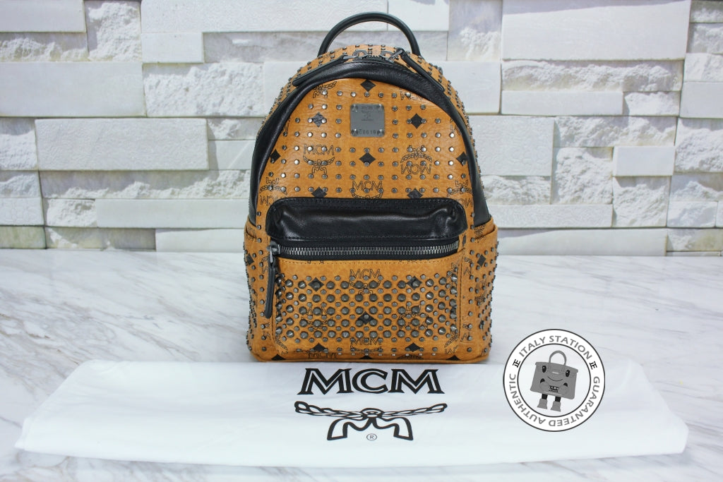 MCM Mcm Mmk 5SVE97 Stark Special Cognac / CO001  Pvc Mini Backpacks Sh | Italystation.com - Shop Now at italystation.com