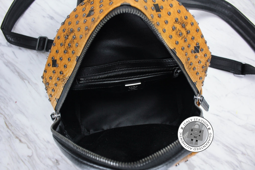 MCM Mcm Mmk 5SVE97 Stark Special Cognac / CO001  Pvc Mini Backpacks Sh | Italystation.com - Shop Now at italystation.com