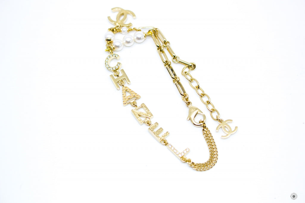CHANEL Chanel AB7943B07831 With CC Logo And Crystal  Gold / NH336 Meta | Italystation.com - Shop Now at italystation.com