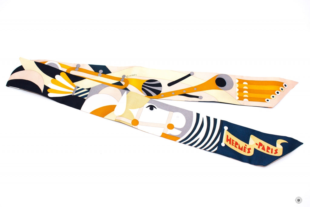 HERMES Hermes H064006 Prade EN Fanfare Twilly Aj/noir/caramel/gris / 0 | Italystation.com - Shop Now at italystation.com