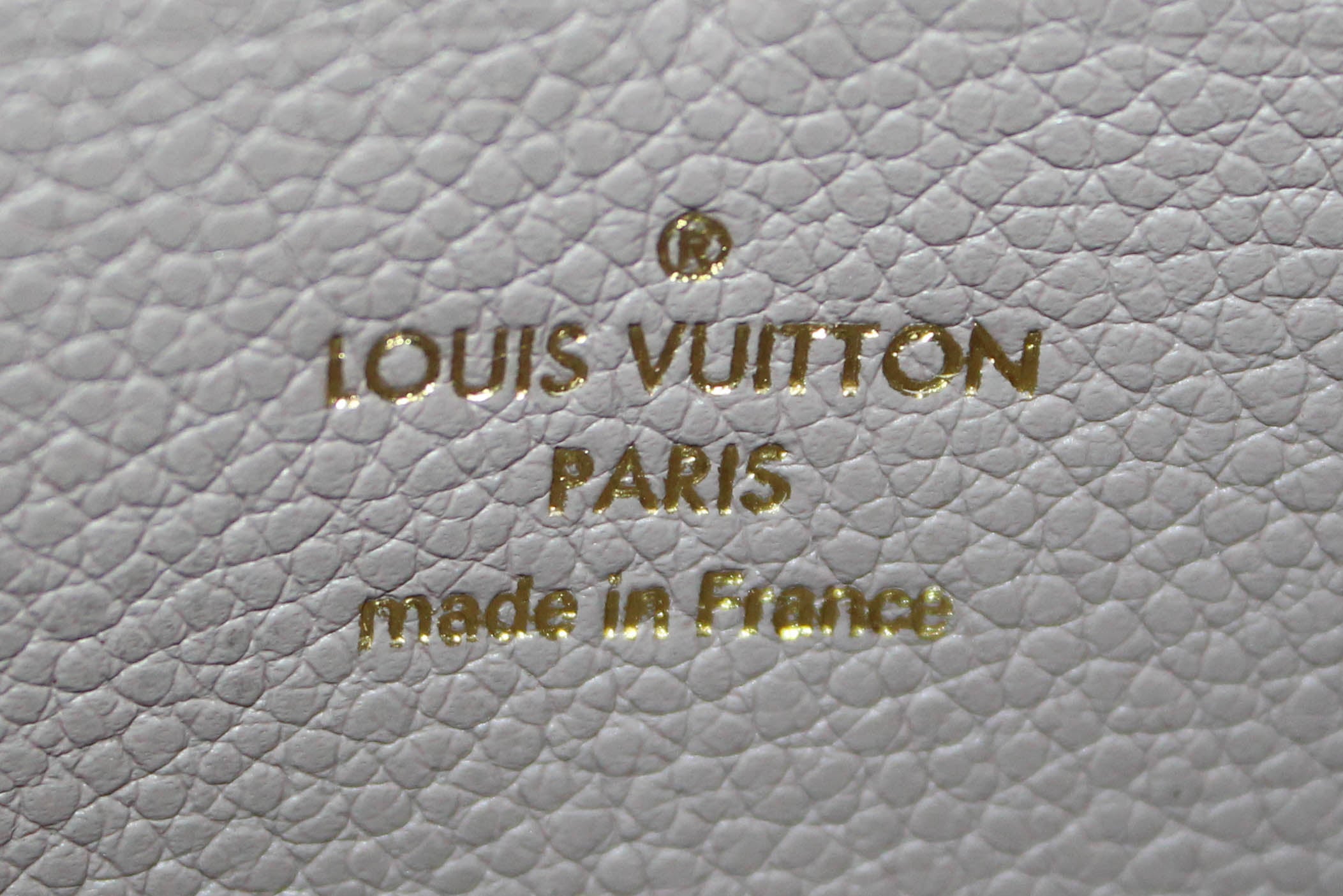 Authentic Louis Vuitton Mastic Monogram Empreinte Leather Zippy Wallet