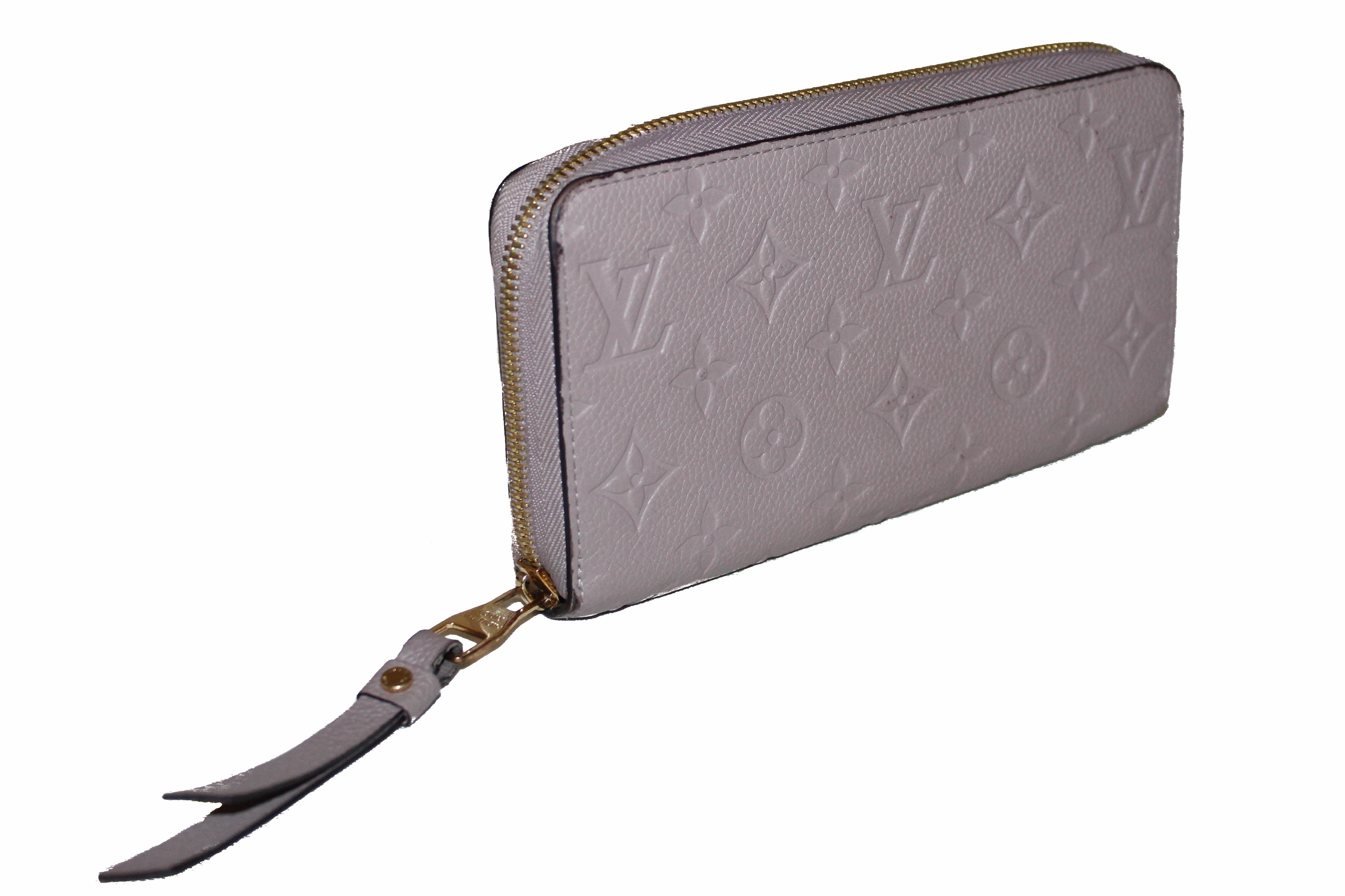 Authentic Louis Vuitton Mastic Monogram Empreinte Leather Zippy Wallet