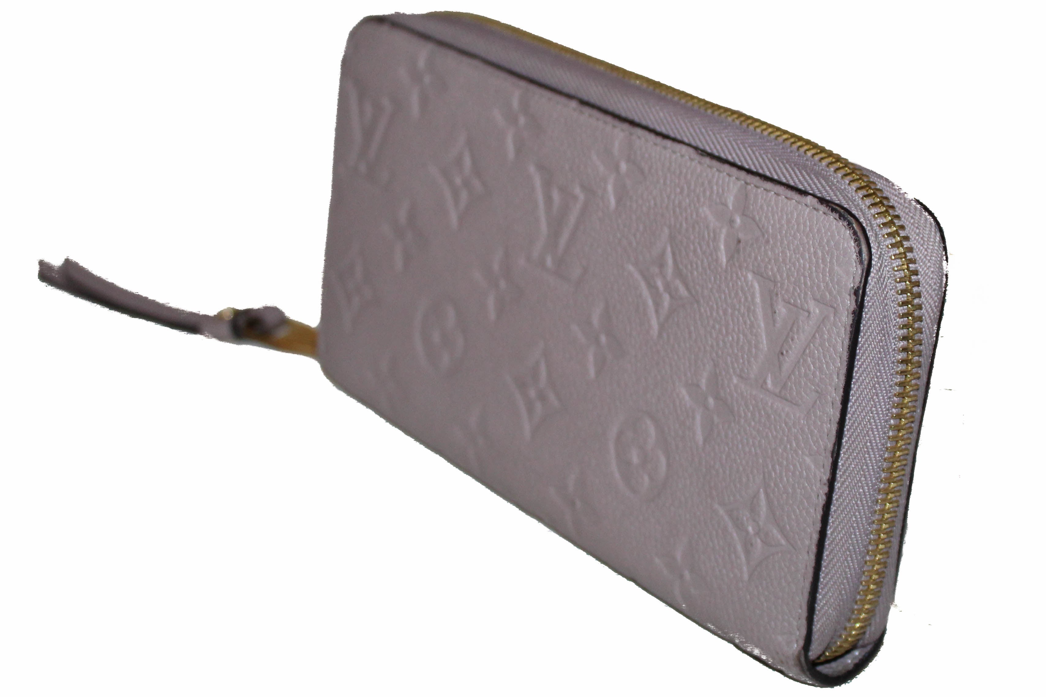 Authentic Louis Vuitton Mastic Monogram Empreinte Leather Zippy Wallet