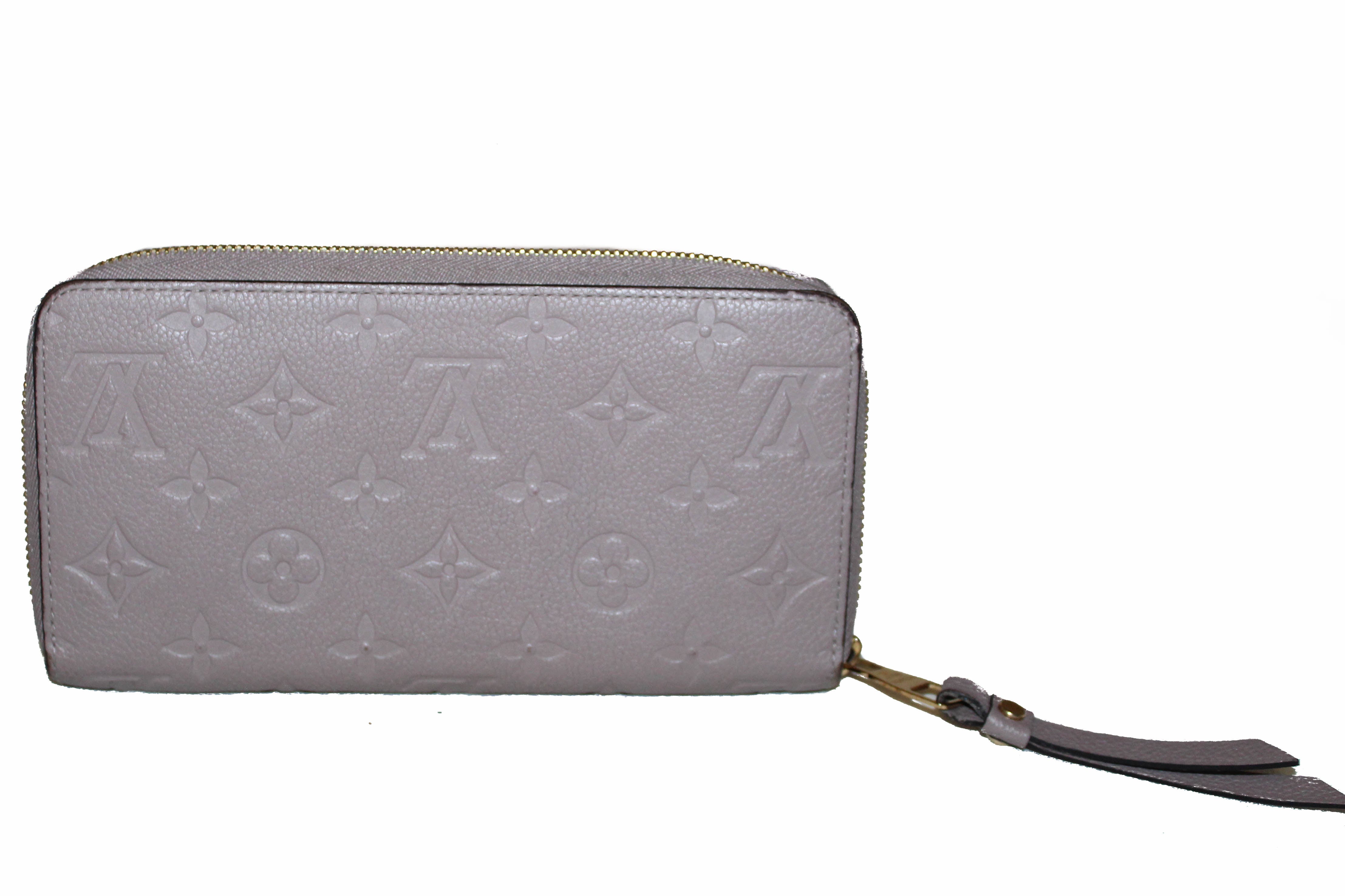 Authentic Louis Vuitton Mastic Monogram Empreinte Leather Zippy Wallet