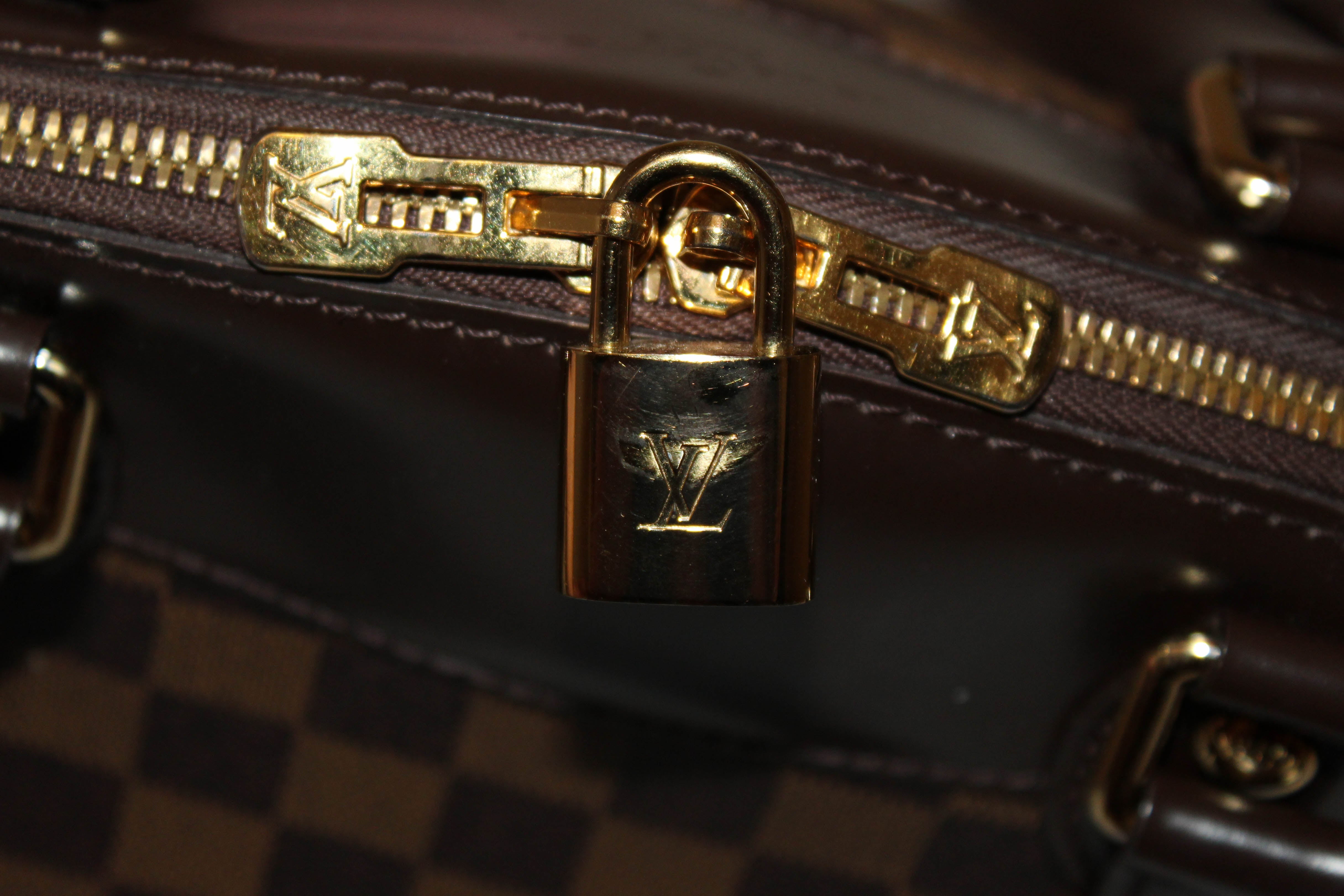 Louis Vuitton, Bags, Authentic Louis Vuitton Rivoli Briefcase Monogram  With Lock 2 Keys Luggage Tag
