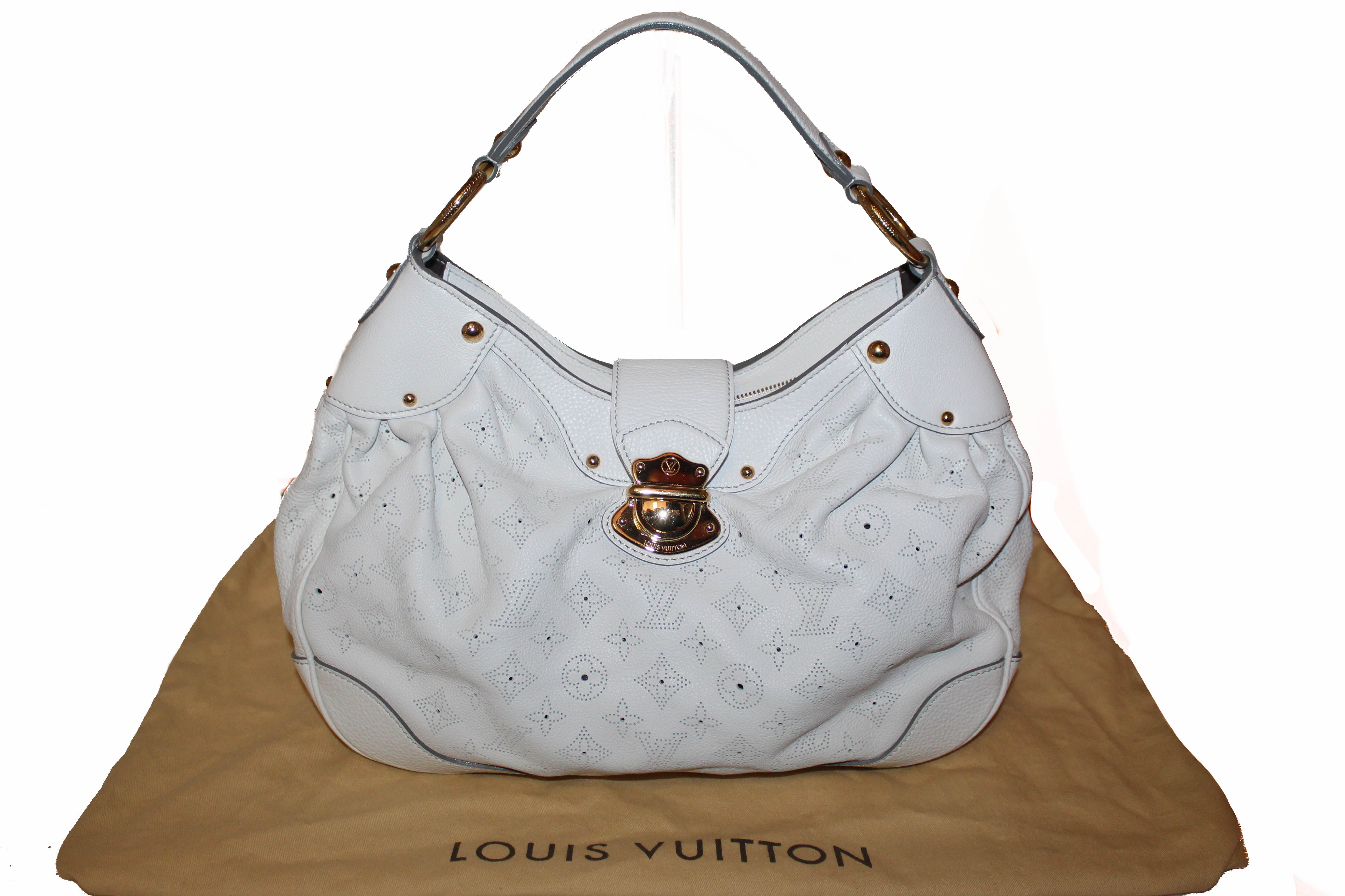 Authentic Louis Vuitton White Perforated Monogram Mahina Leather