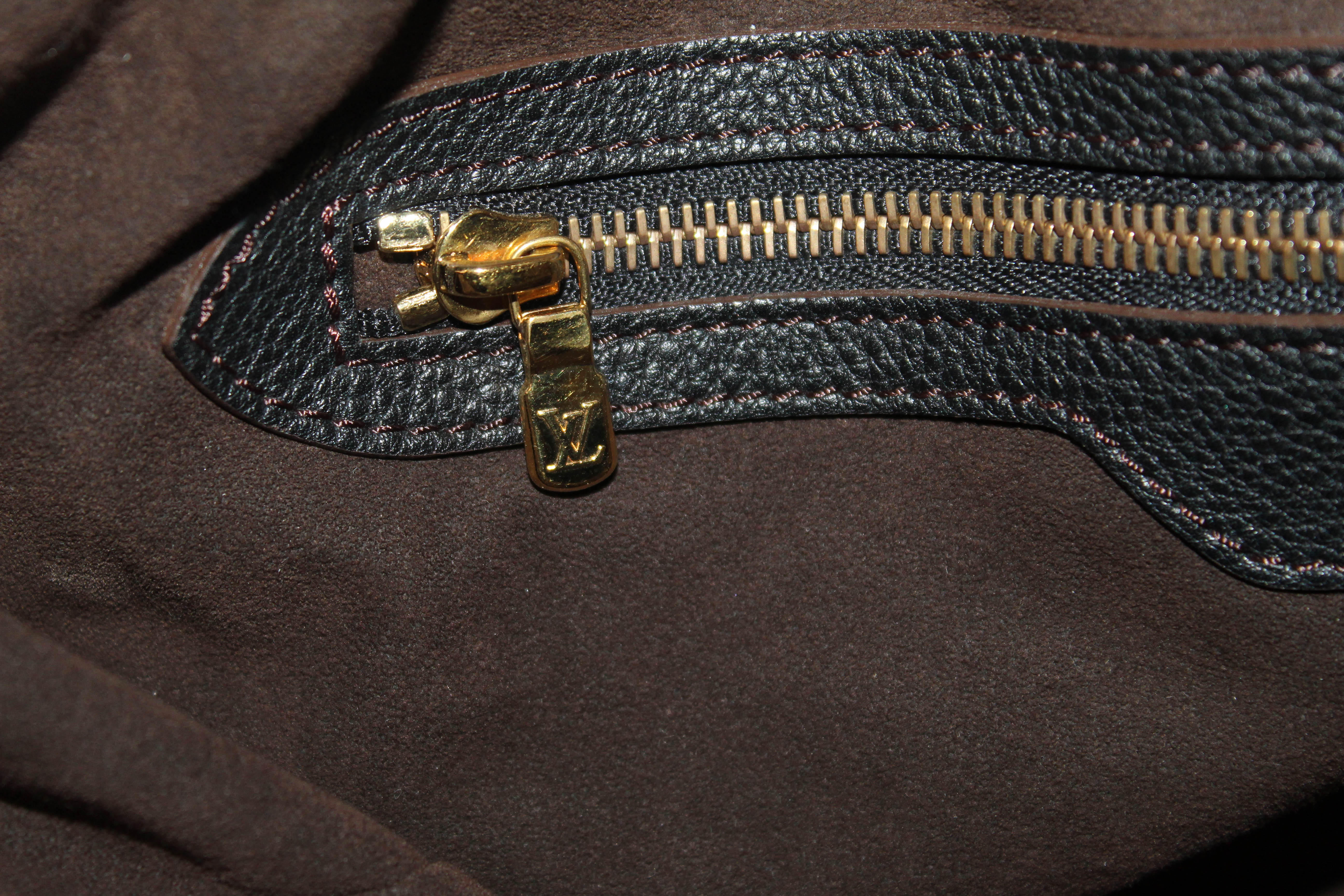 Authentic Louis Vuitton Black Perofrated Monogram Mahina Leather XL Bag