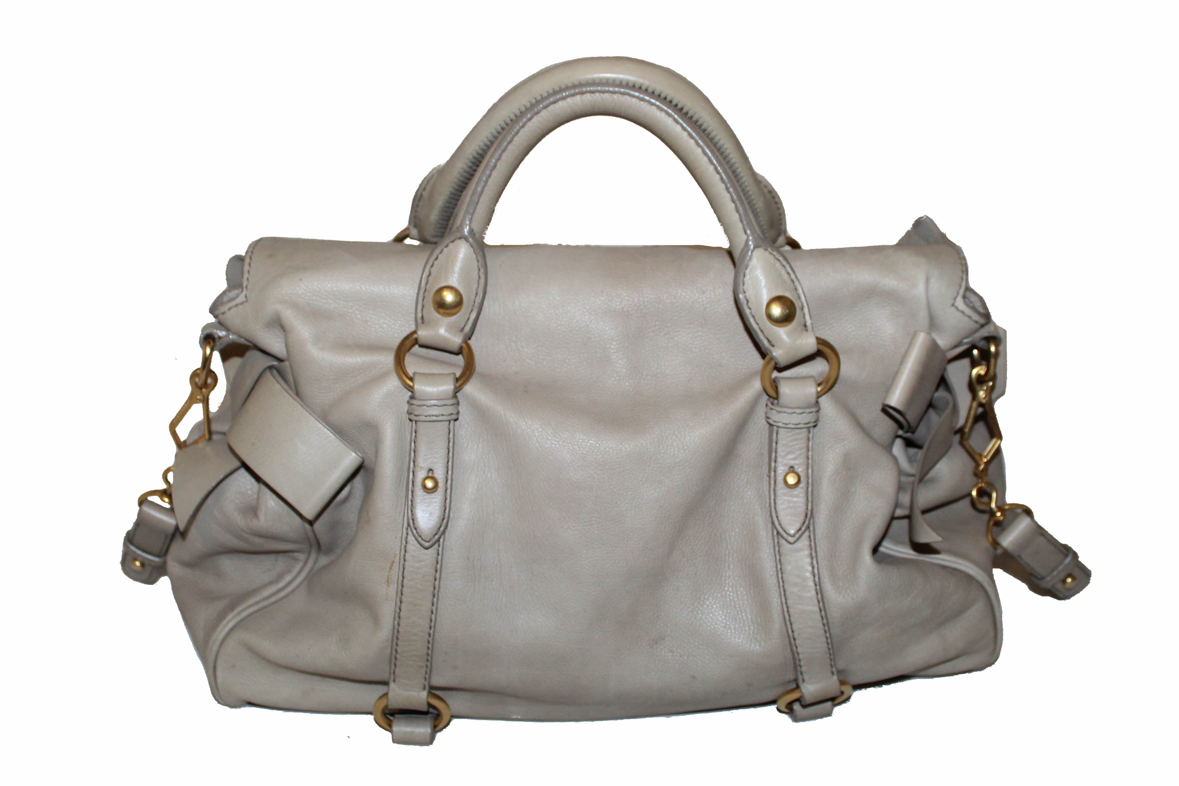 Authentic Miu Miu Vitello Lux Bow Leather Hand Bag in Cream with