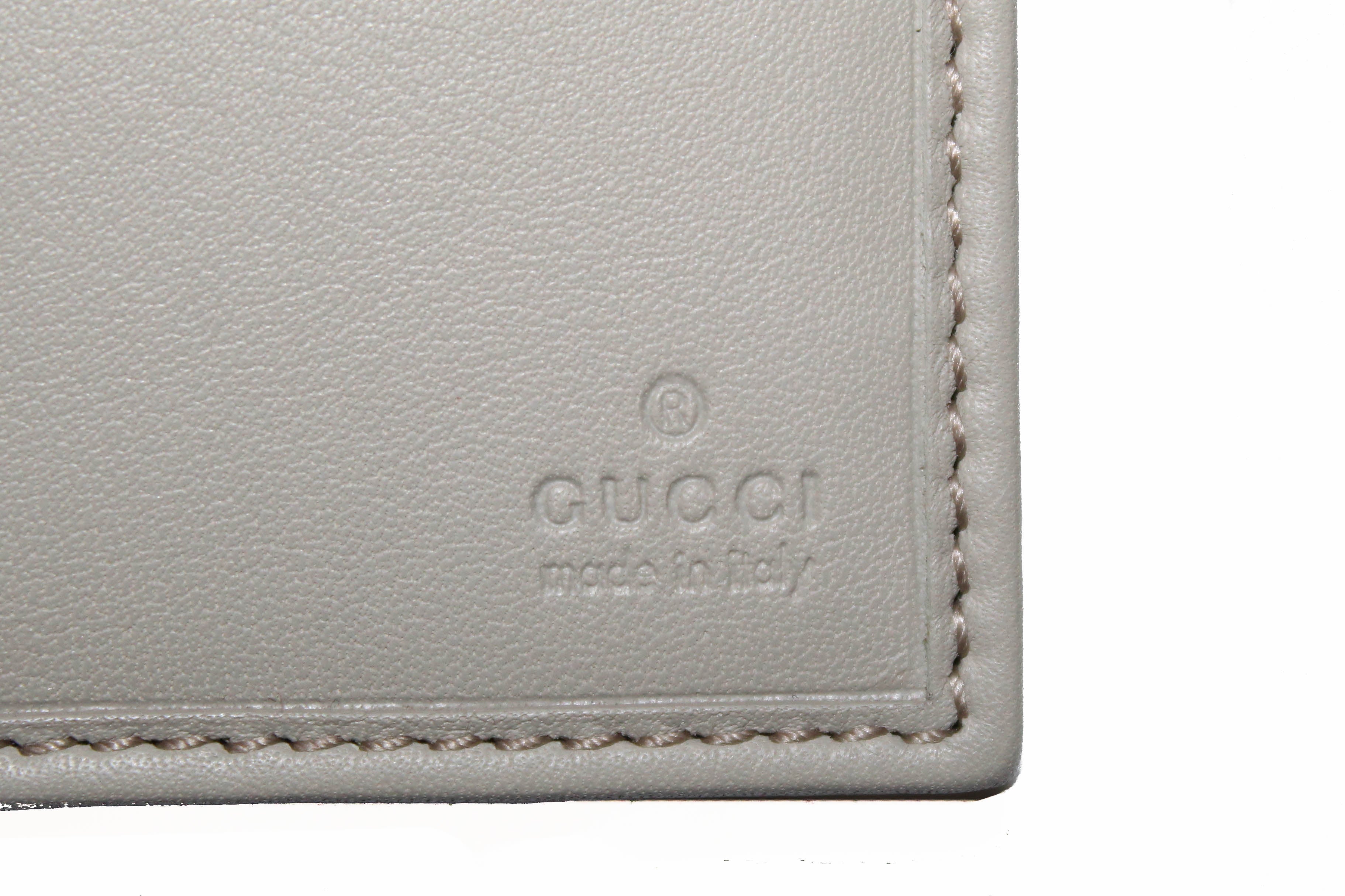 Authentic Gucci Ivory Guccissima Leather D-Ring Long Wallet