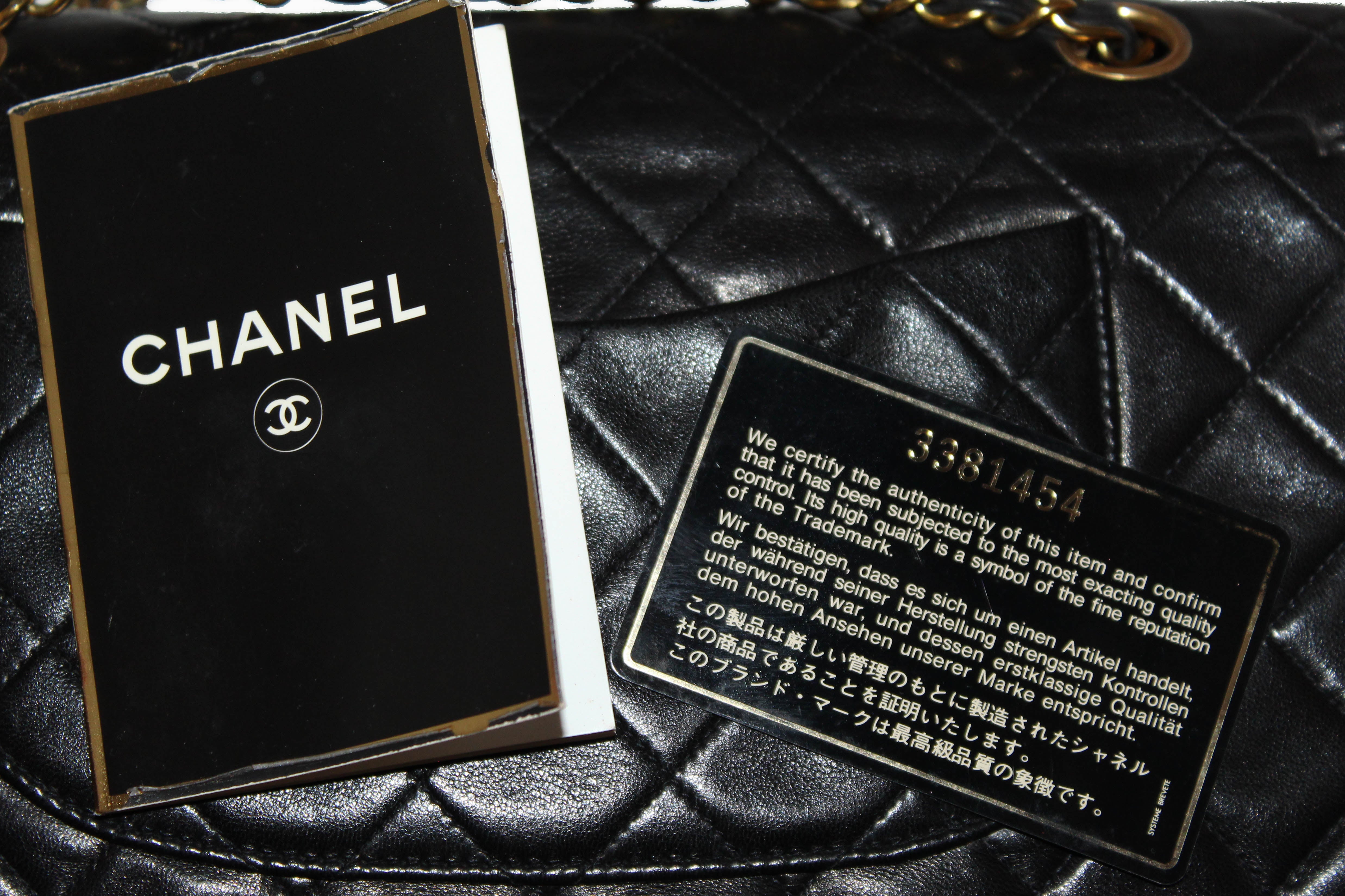 Authentic Vintage Chanel Black Medium Quilted Lambskin Leather Double Flap Bag
