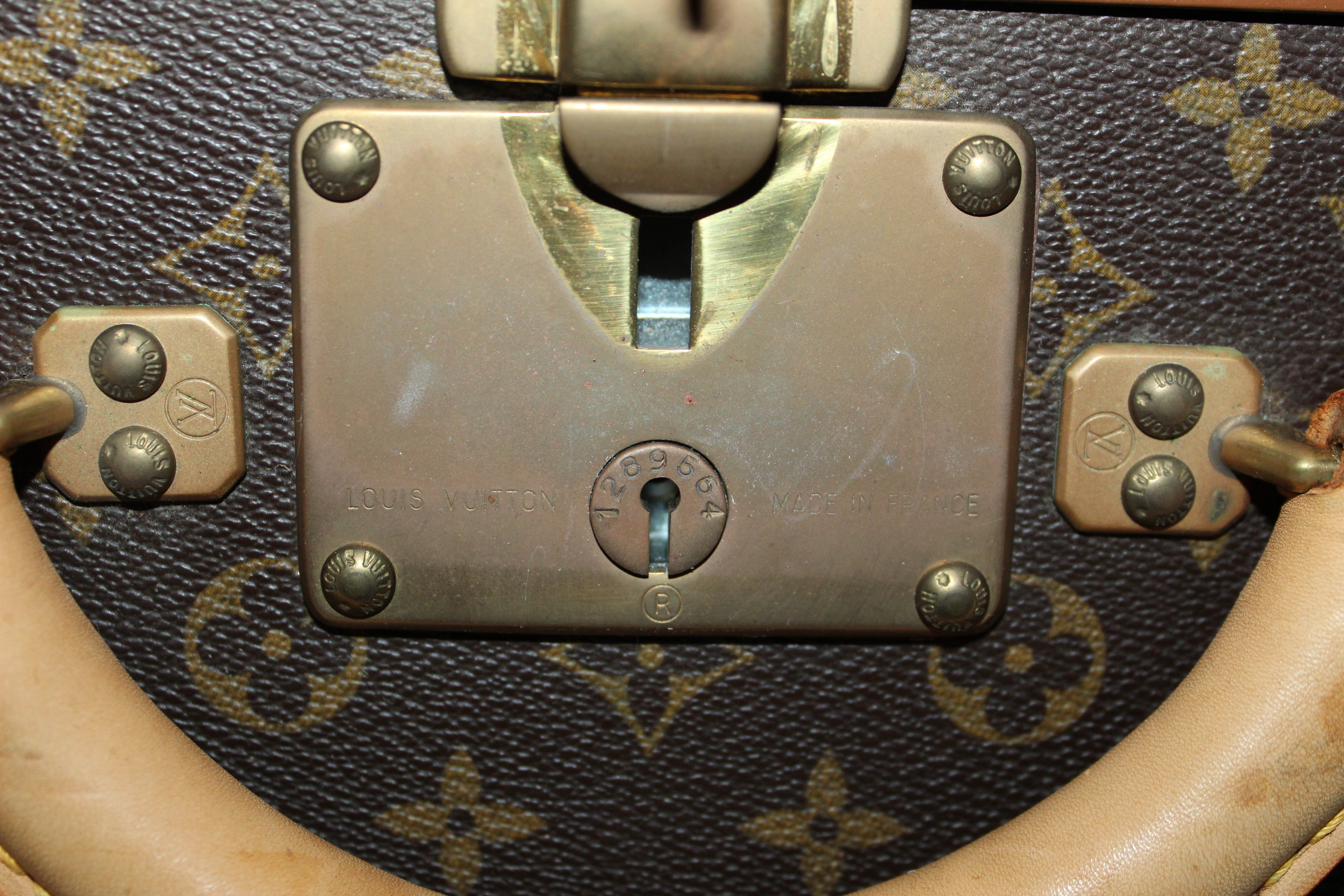 Bonhams : A MONOGRAM ALZER 75 SUITCASE Louis Vuitton (includes key)
