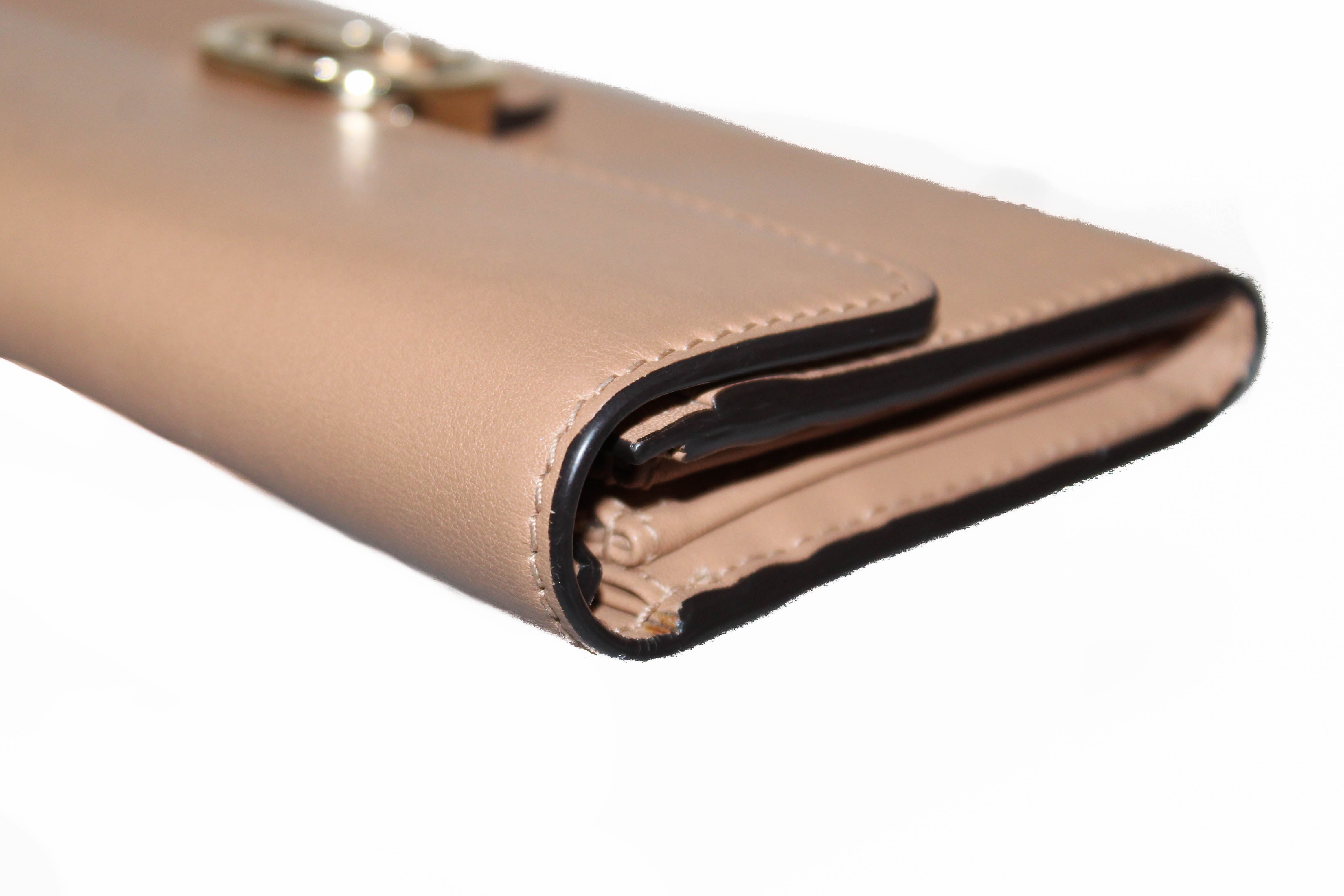 Authentic Gucci Beige Interlocking GG Soft Calfskin Leather Flap Wallet