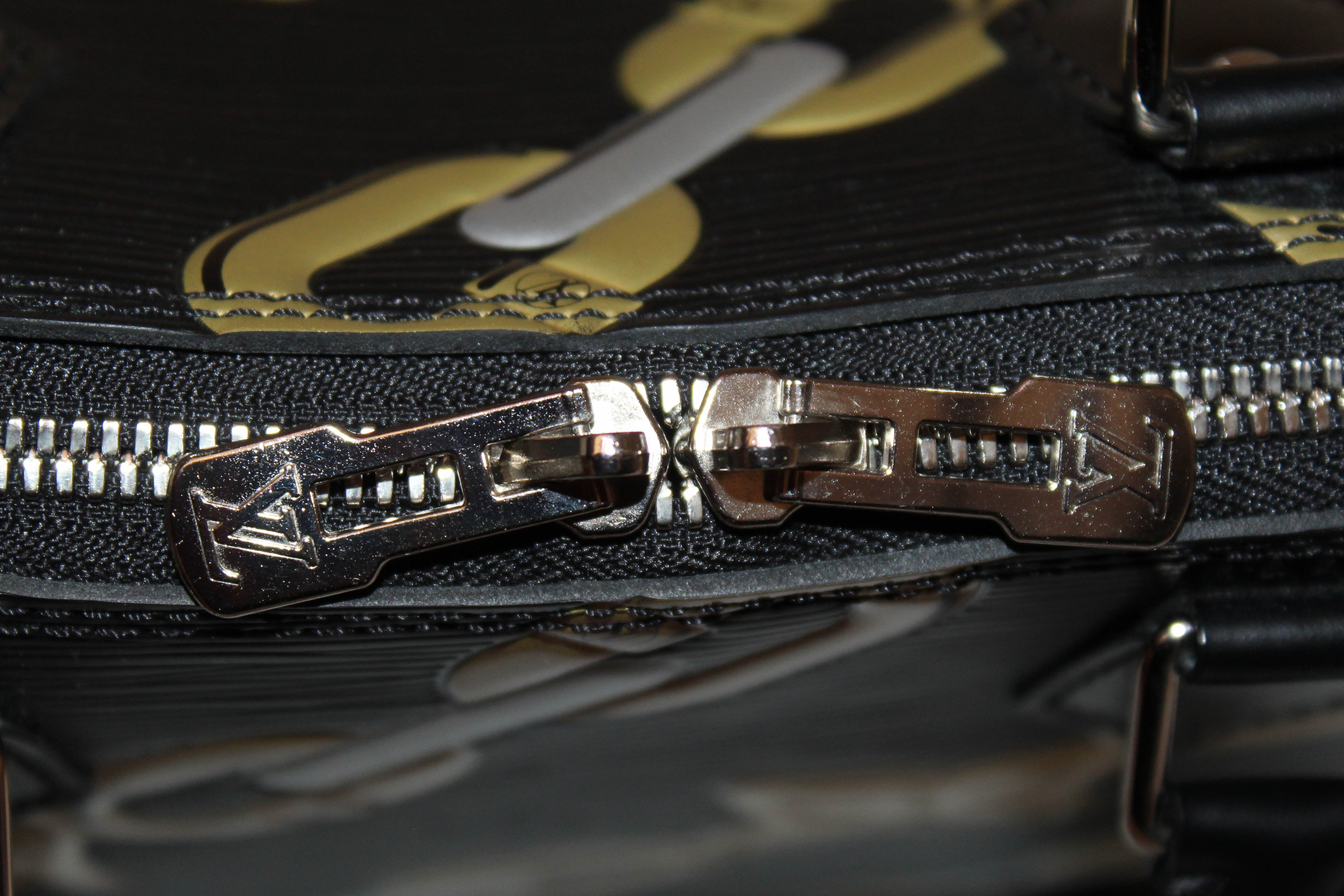 Authentic Louis Vuitton Black Epi Leather Chain Flower Alma PM Handbag