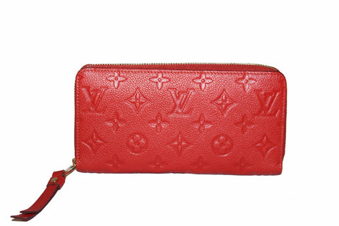 Authentic Louis Vuitton Orange Red Orient Monogram Empreinte Leather Zippy Wallet