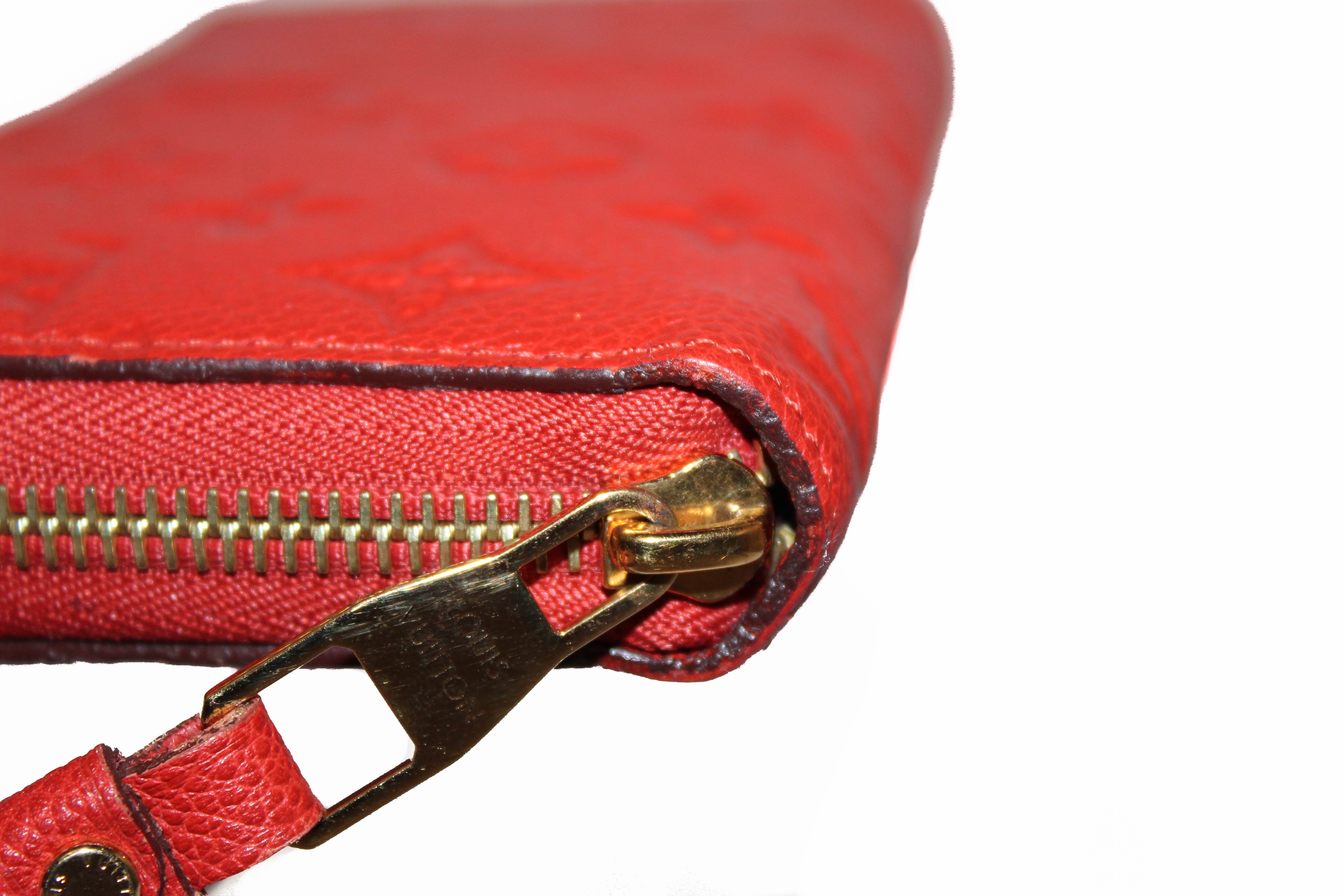 Authentic Louis Vuitton Orange Red Orient Monogram Empreinte Leather Zippy Wallet
