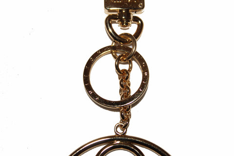 Authentic Louis Vuitton Gold Flower Finesse Bag Charm & Key Holder