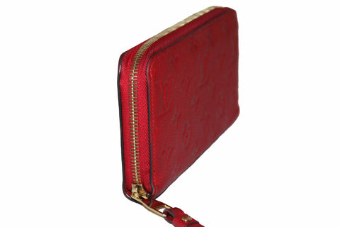 Authentic Louis Vuitton Red Empreinte Leather Zippy Wallet