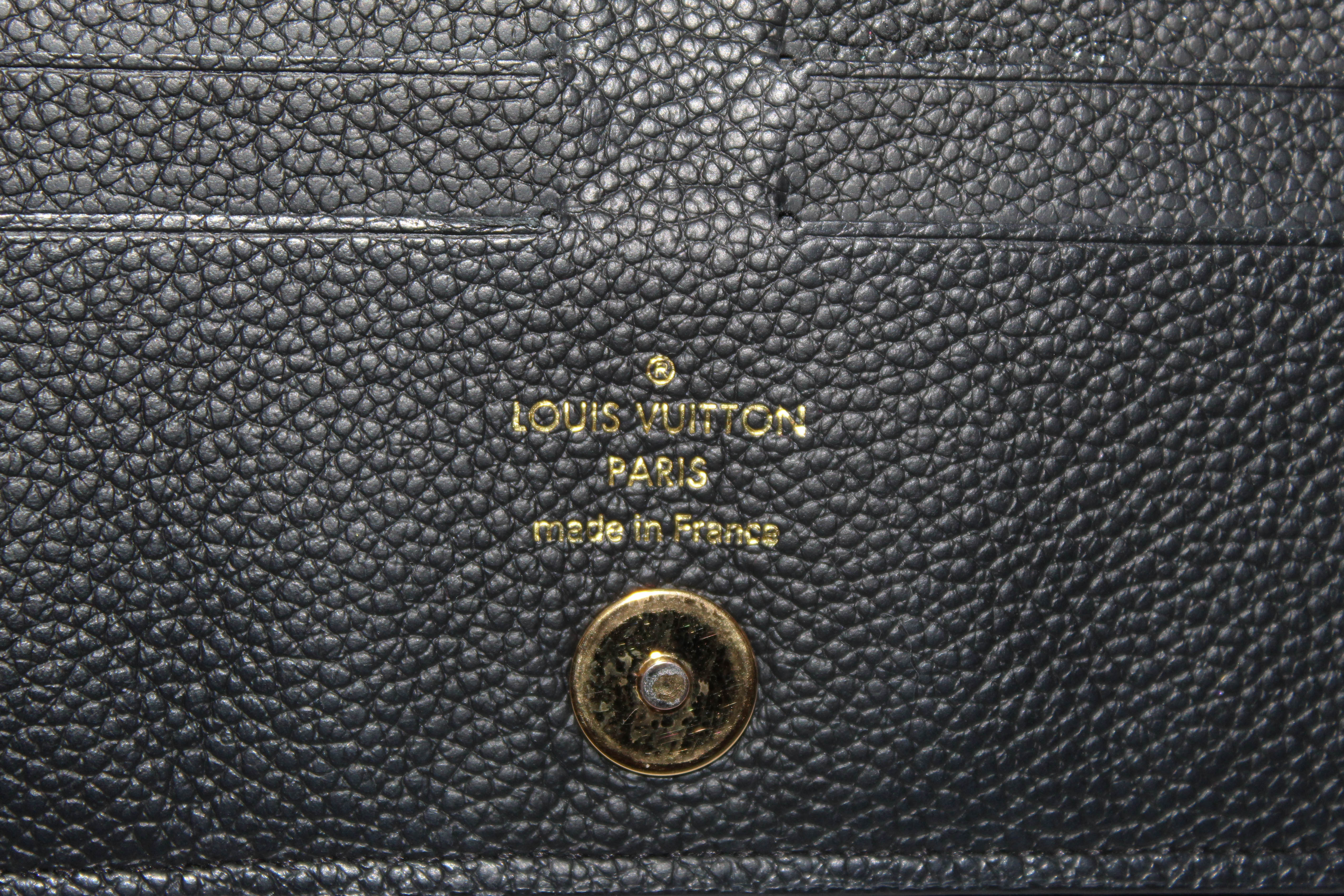 Authentic Louis Vuitton Black Monogram Empreinte Leather Adele Long Wa –  Paris Station Shop