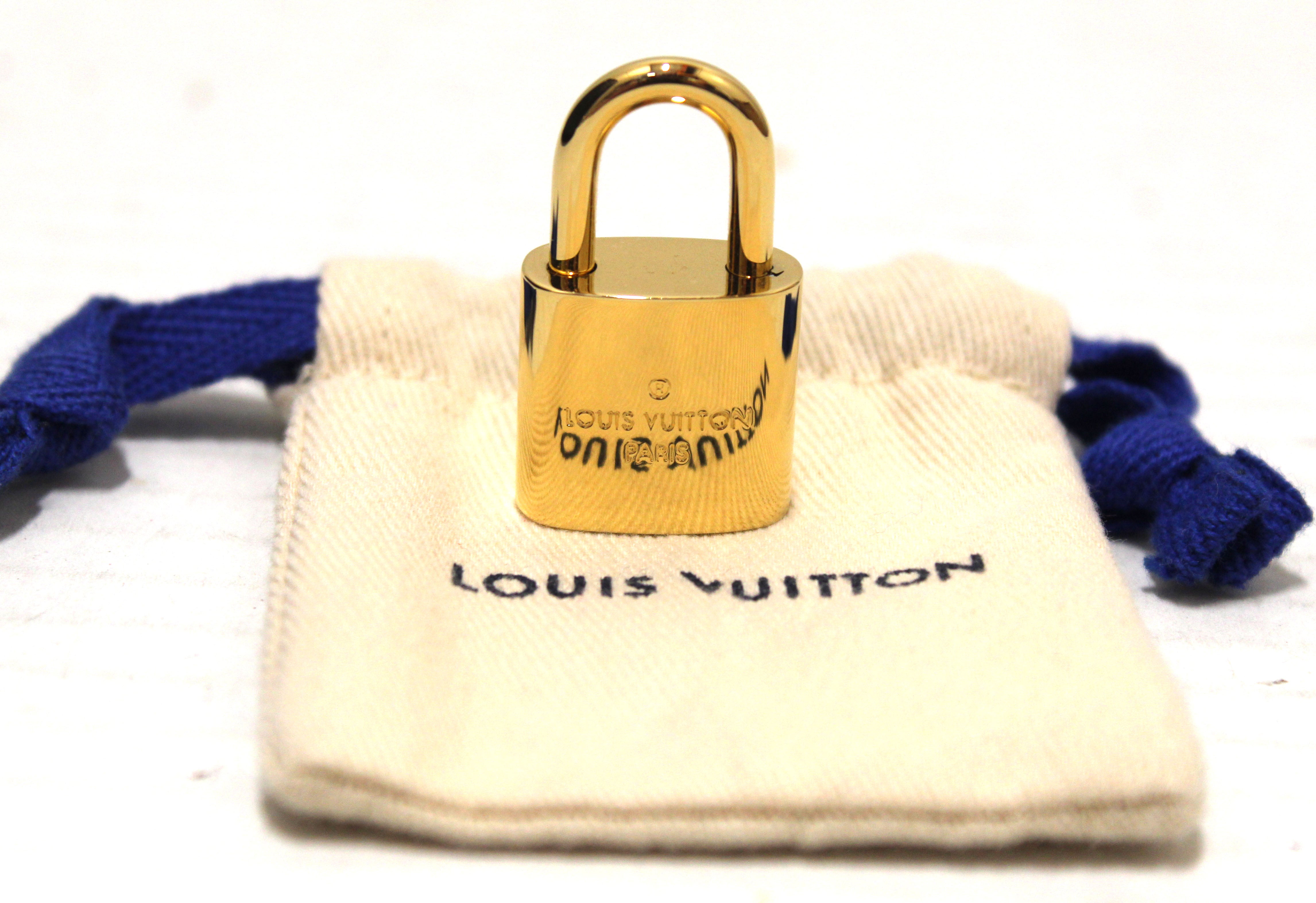 Authentic Louis Vuitton Blue Monogram Empreinte Leather Montaigne MM Bag
