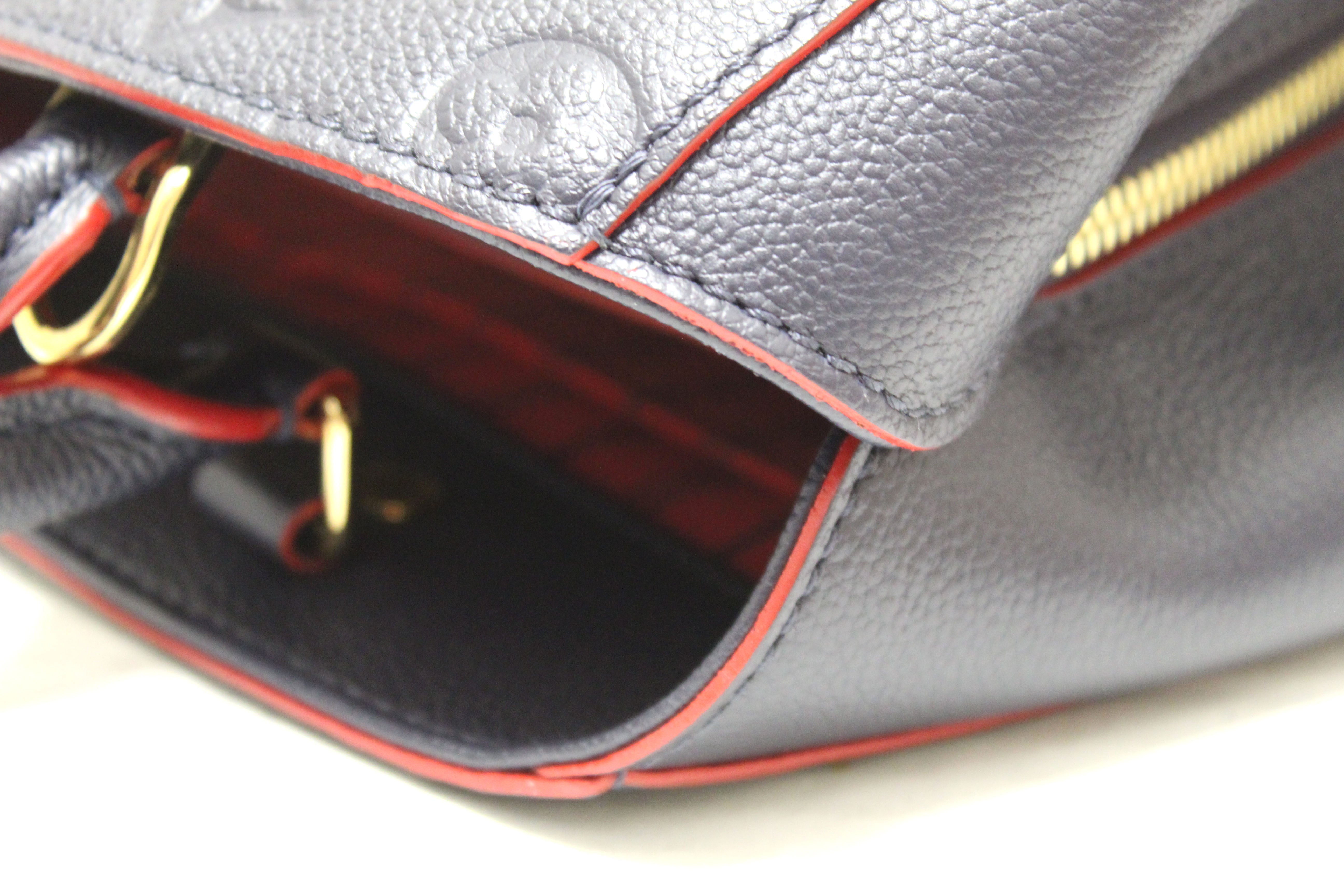 Authentic Louis Vuitton Blue Monogram Empreinte Leather Montaigne MM Bag