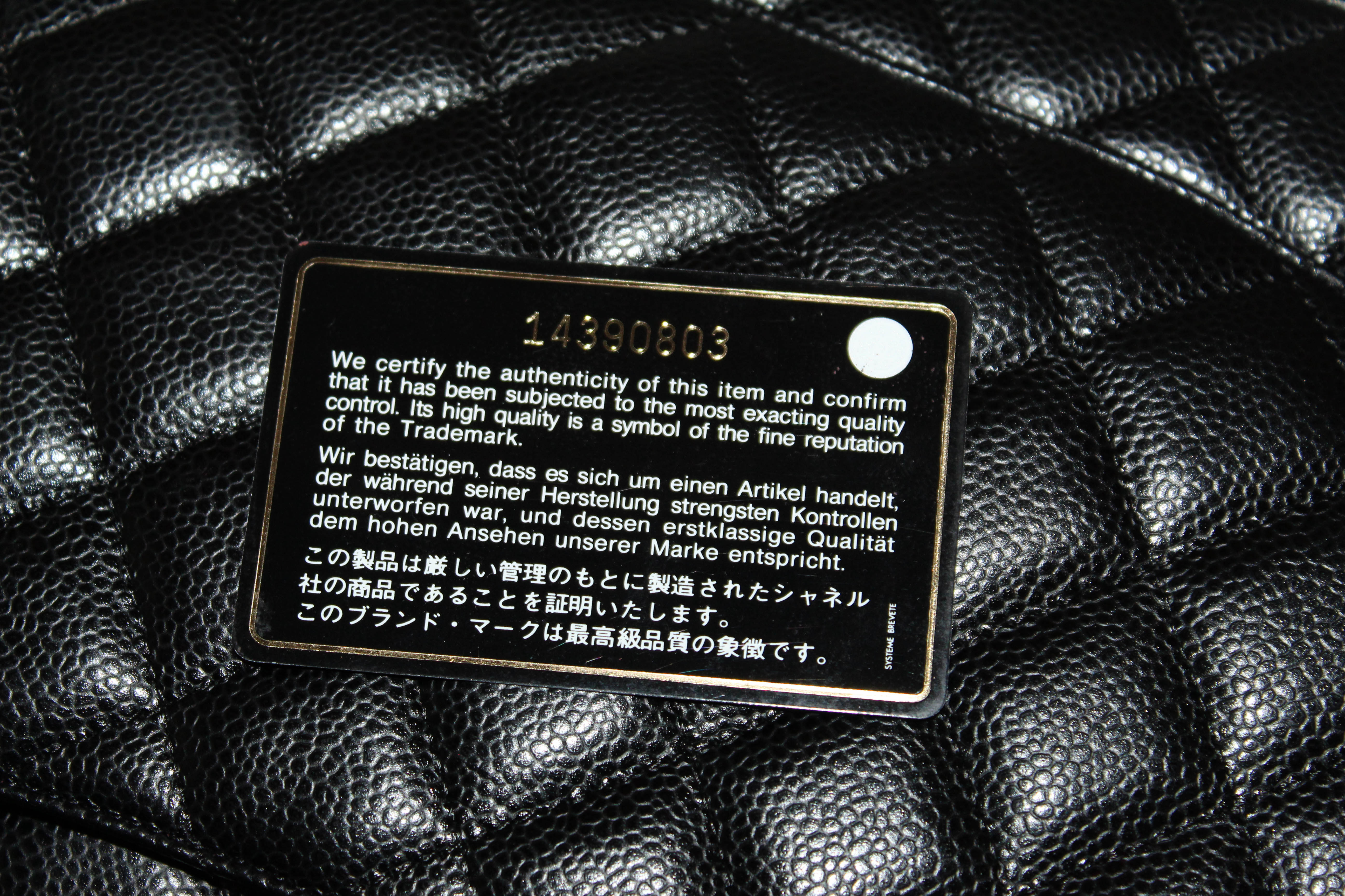 Authentic Chanel Black Quilted Caviar Leather Maxi Double Flap Bag