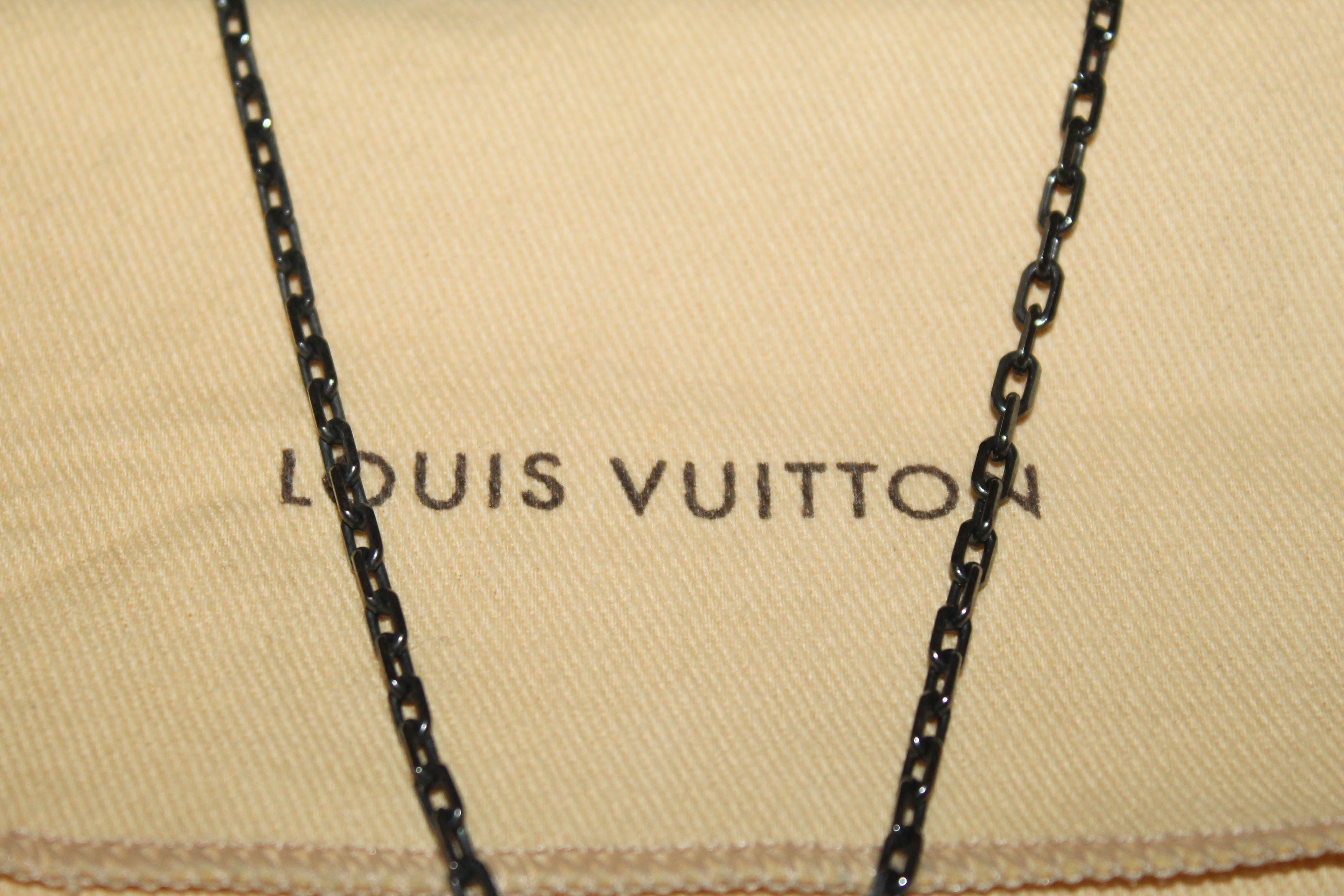 Men's Fashion Louis Vuitton Champs-Elysées Steel Plated Monogram Charm  Hollowed-out LV Douoble Tags Pendant
