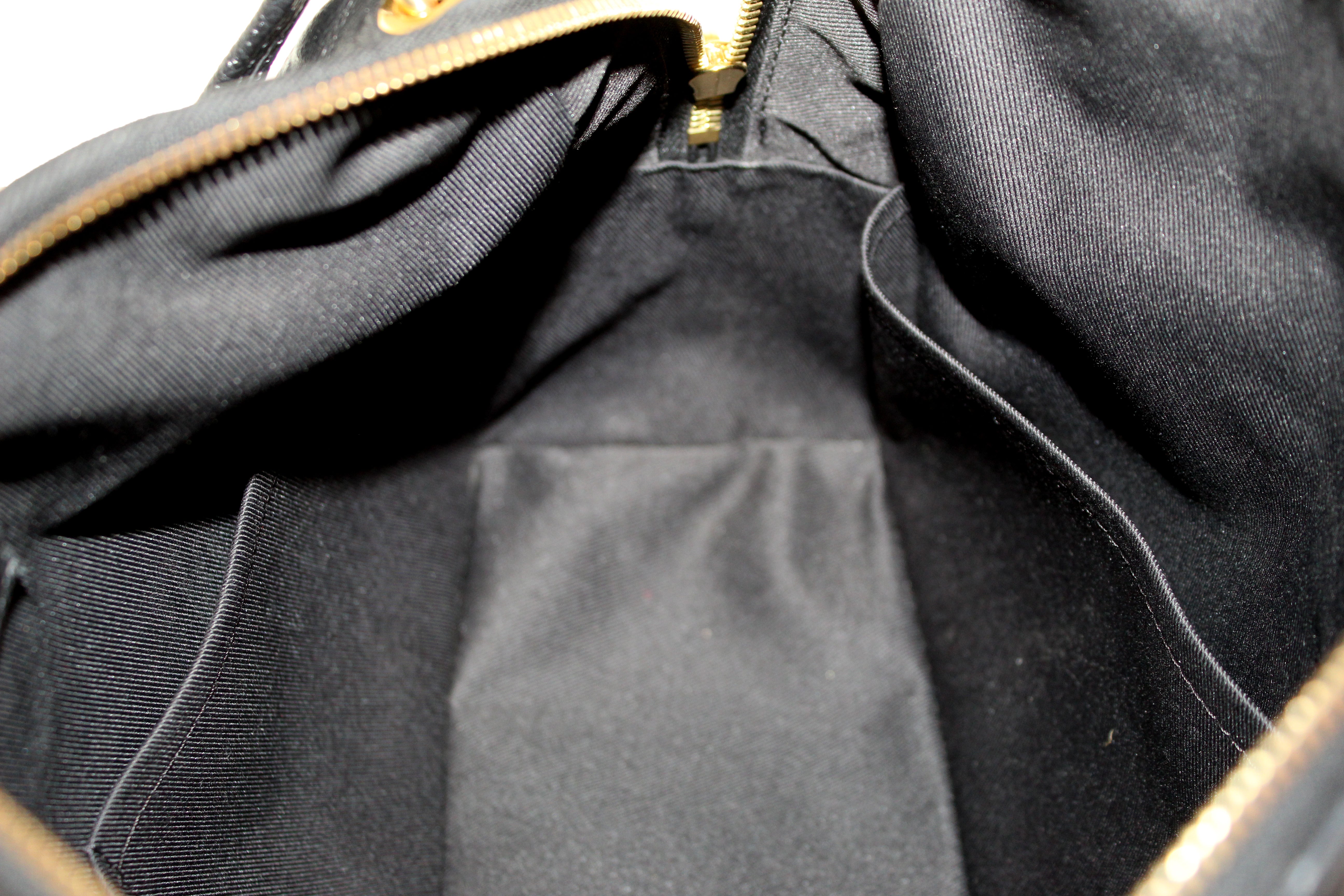 Authentic Louis Vuitton Black Monogram Empreinte Leather Ponthieu PM