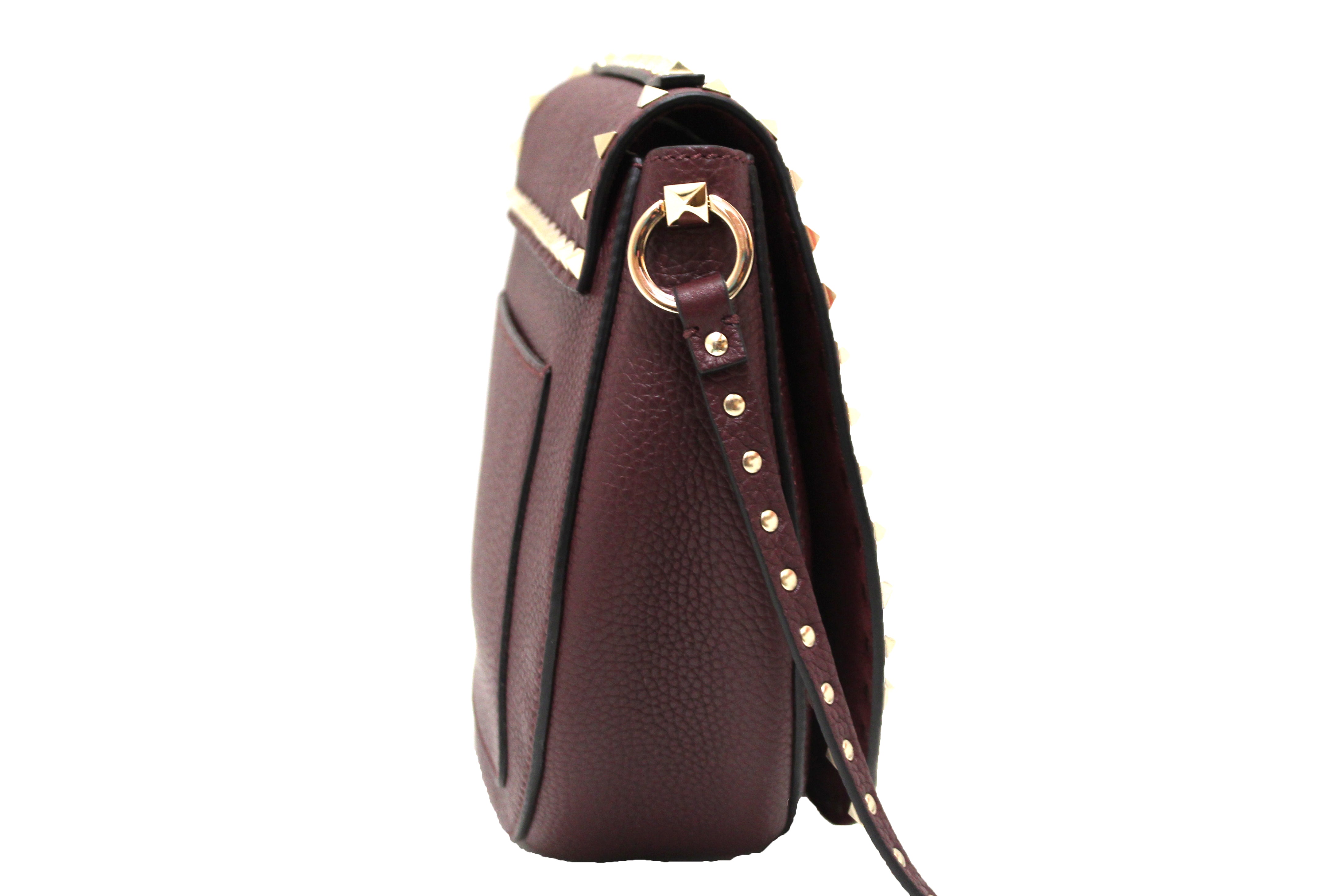 Authentic NEW Valentino Garavani Burgundy Pebbled Calfskin Rockstud Haftmoon Saddle Bag