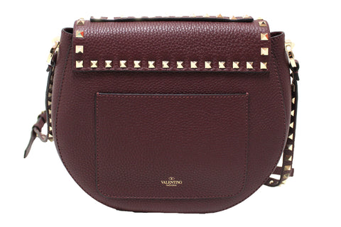 Authentic NEW Valentino Garavani Burgundy Pebbled Calfskin Rockstud Haftmoon Saddle Bag