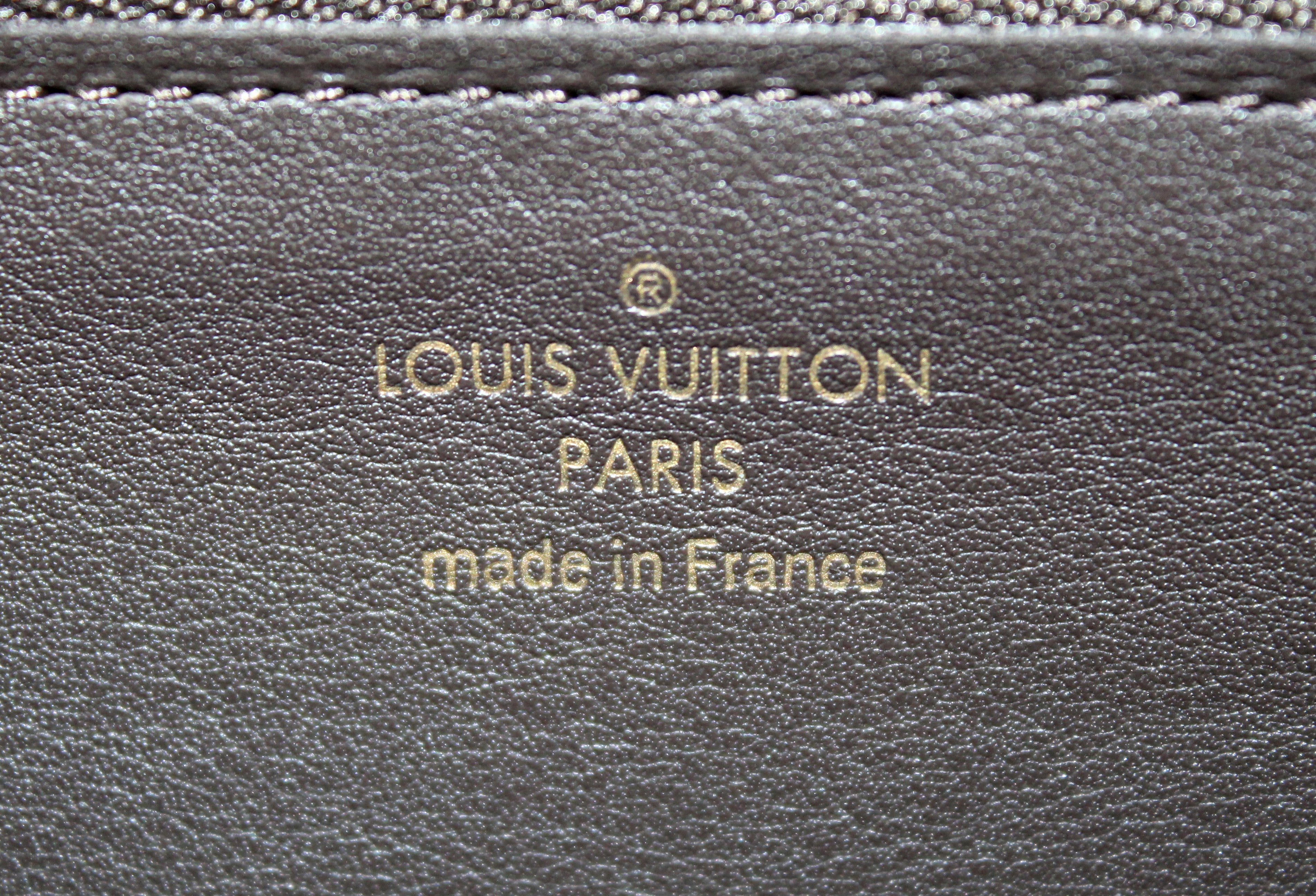 Authentic Louis Vuitton Galet Taurillon Leather Capucines Wallet