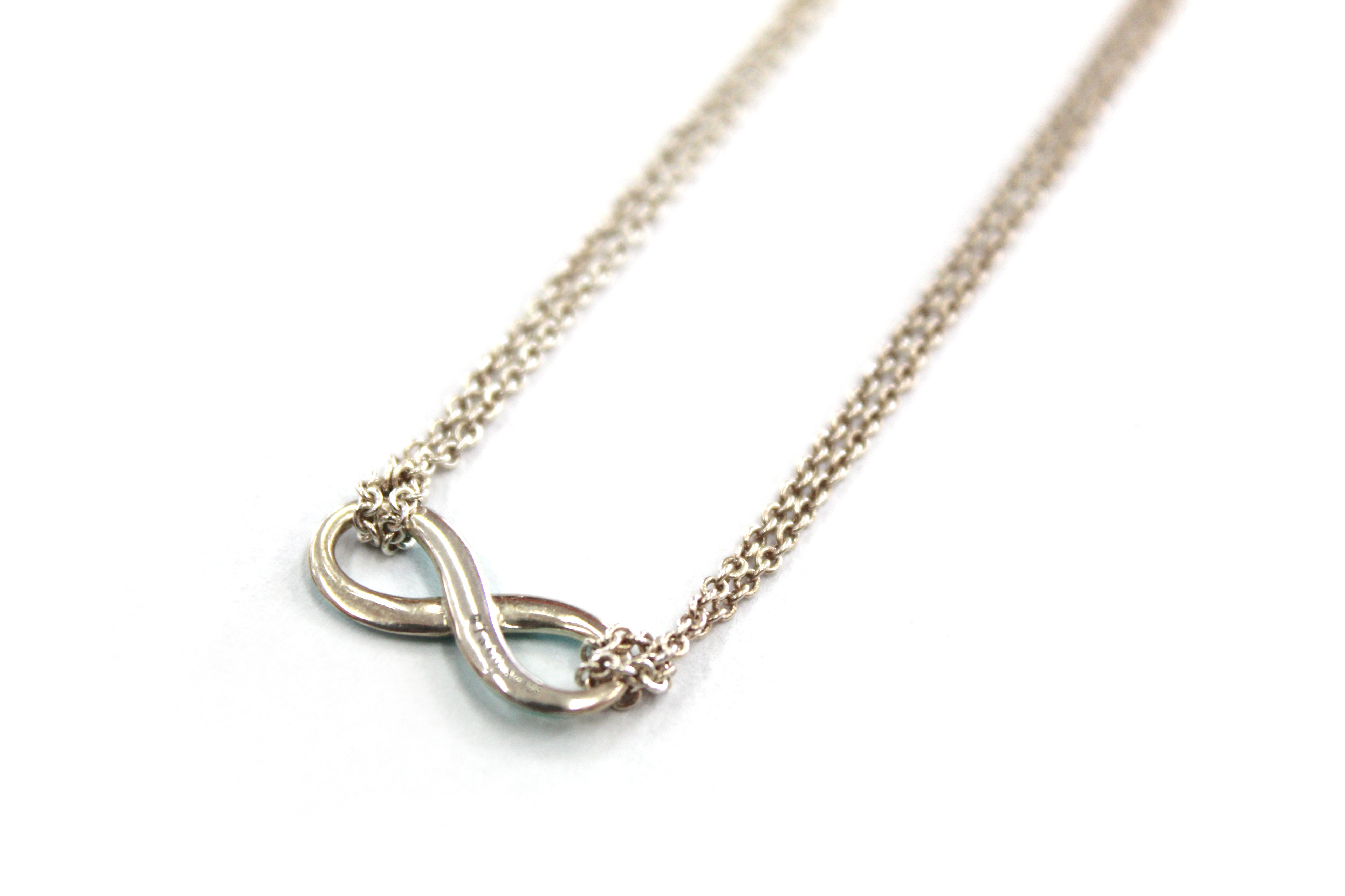 Authentic Tiffany & Co. Sterling Silver 1" Blue Infinity Necklace