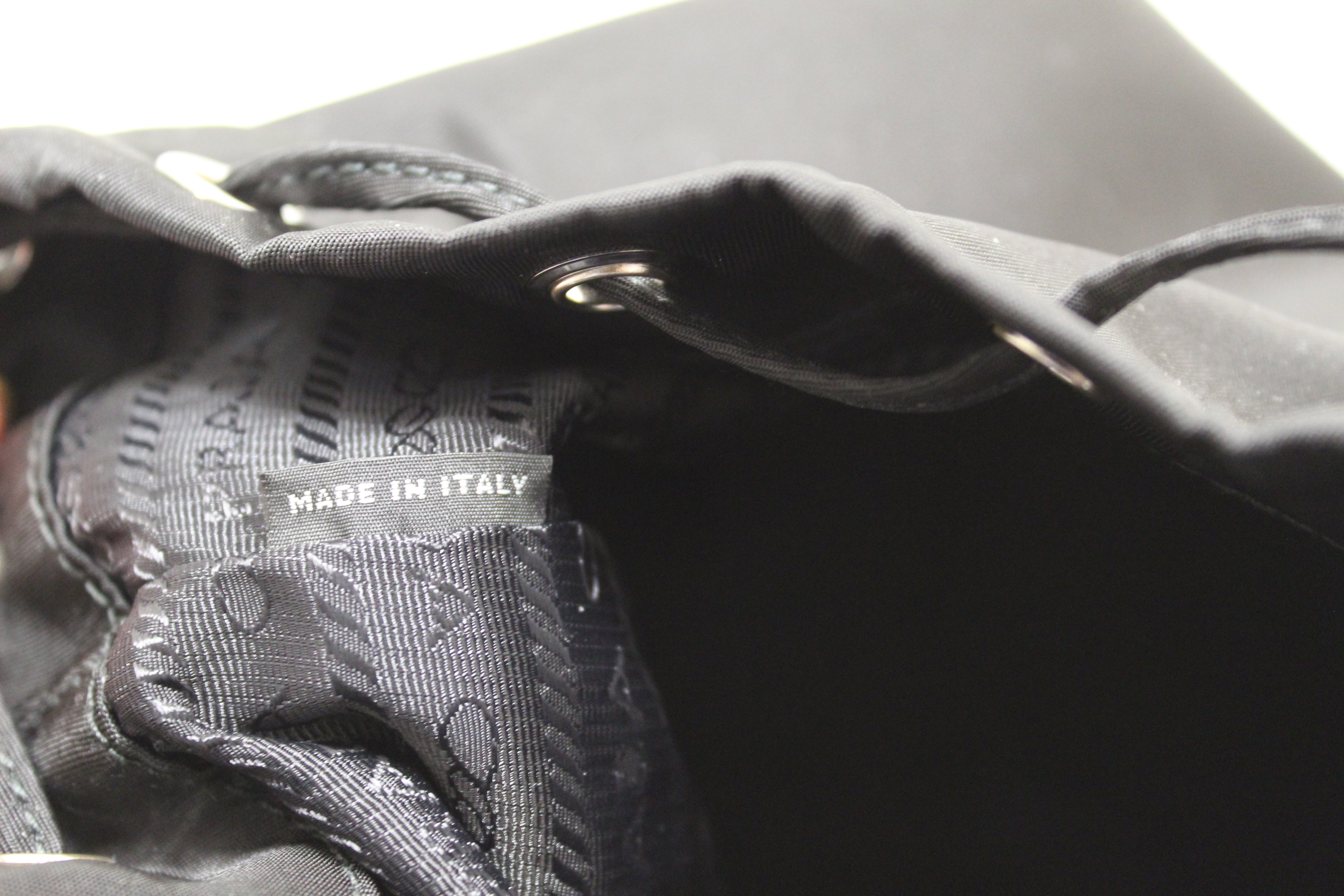 Authentic New Prada Black Nylon Drawstring Wristlet Pouch with Metal Appliques