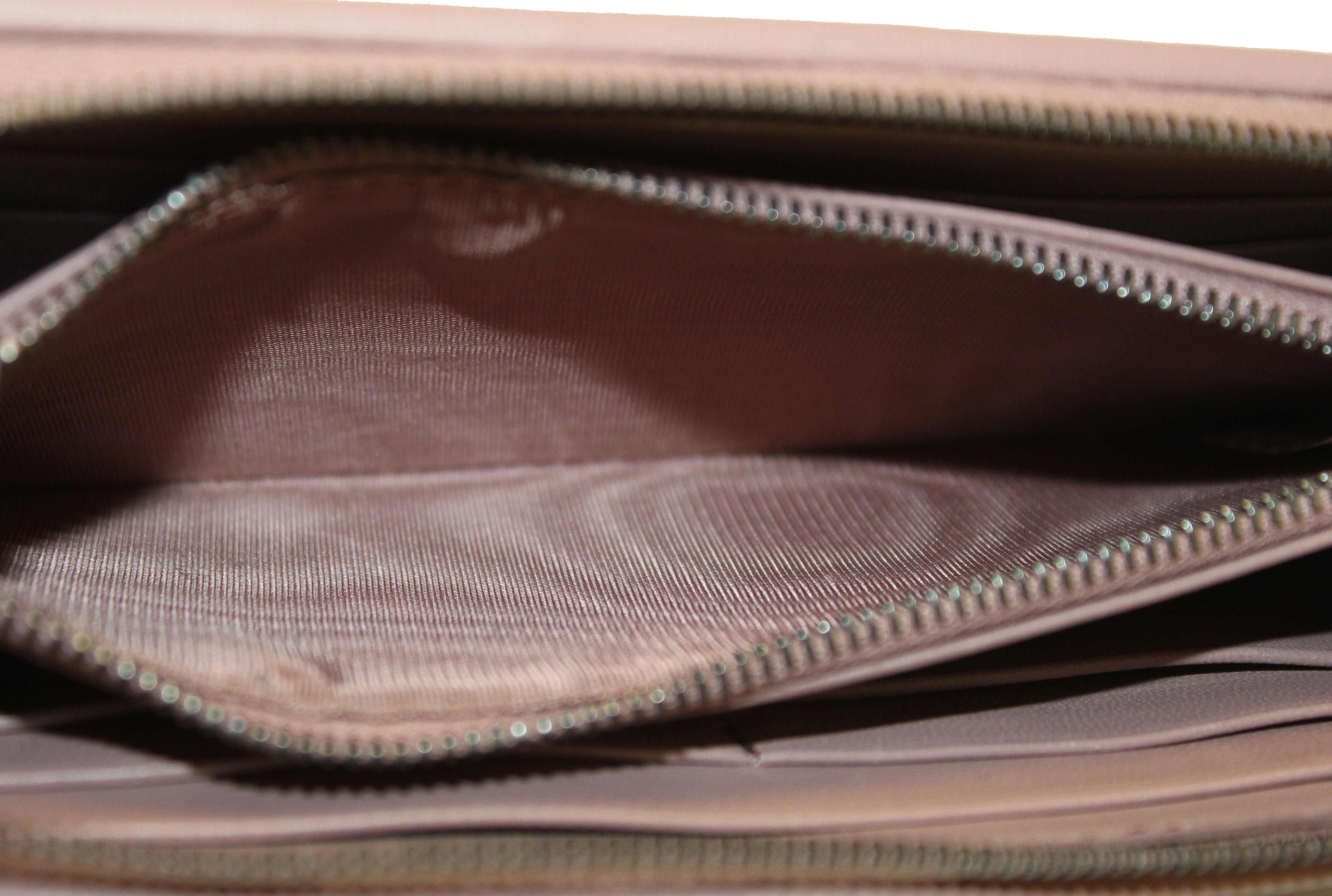 Authentic Bottega Veneta Dusty Rose Nappa Intrecciato Leather Zip Around Wallet