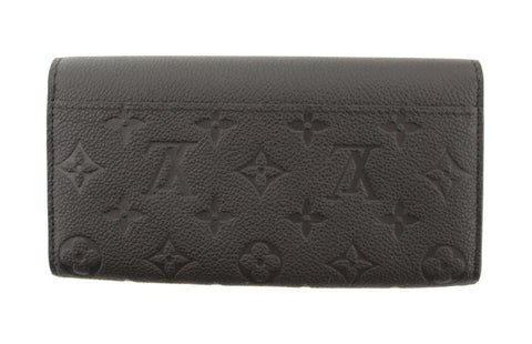 Authentic Louis Vuitton Black Monogram Empreinte Leather Sarah Wallet