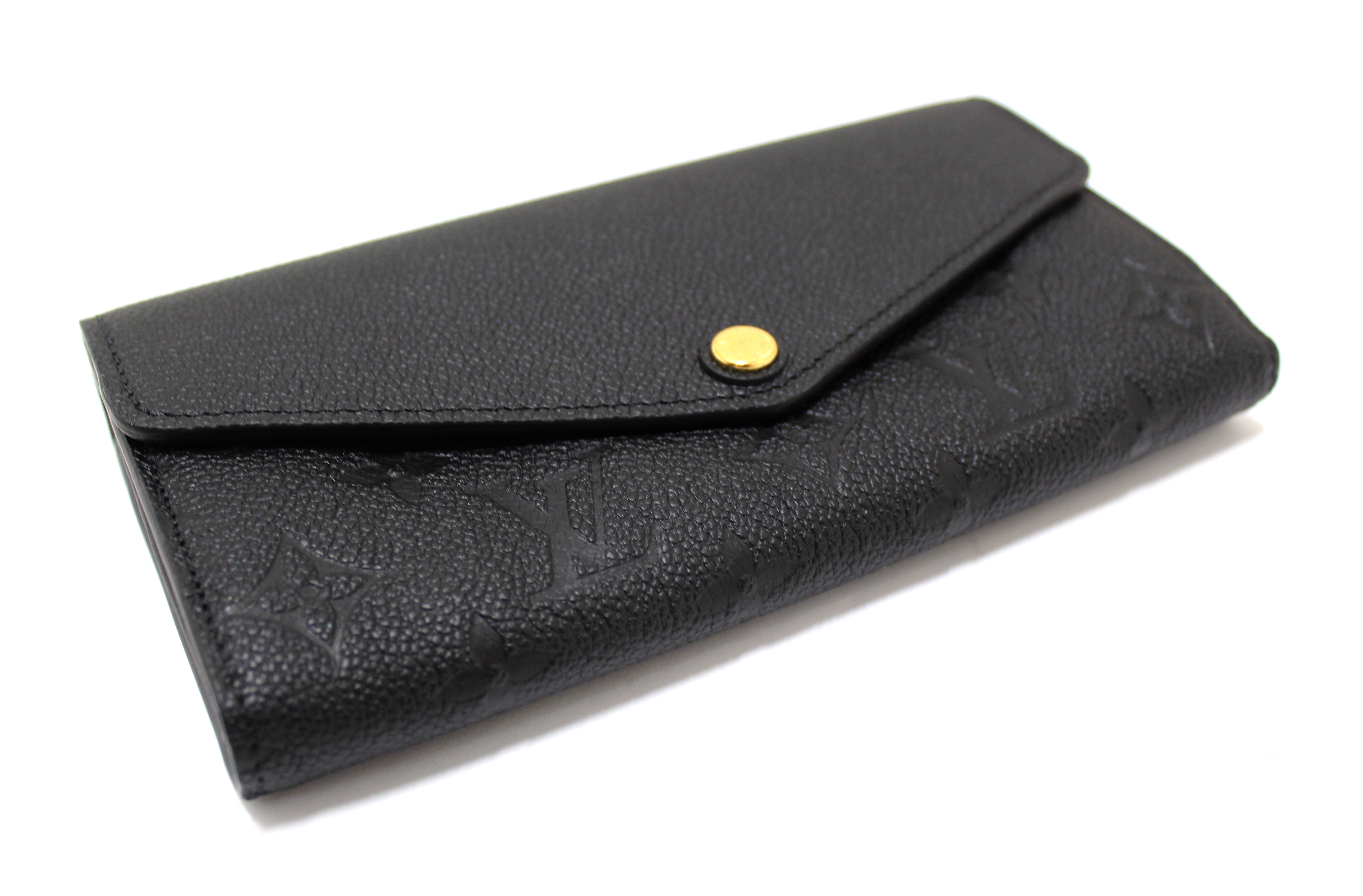 Authentic Louis Vuitton Black Monogram Empreinte Leather Sarah Wallet