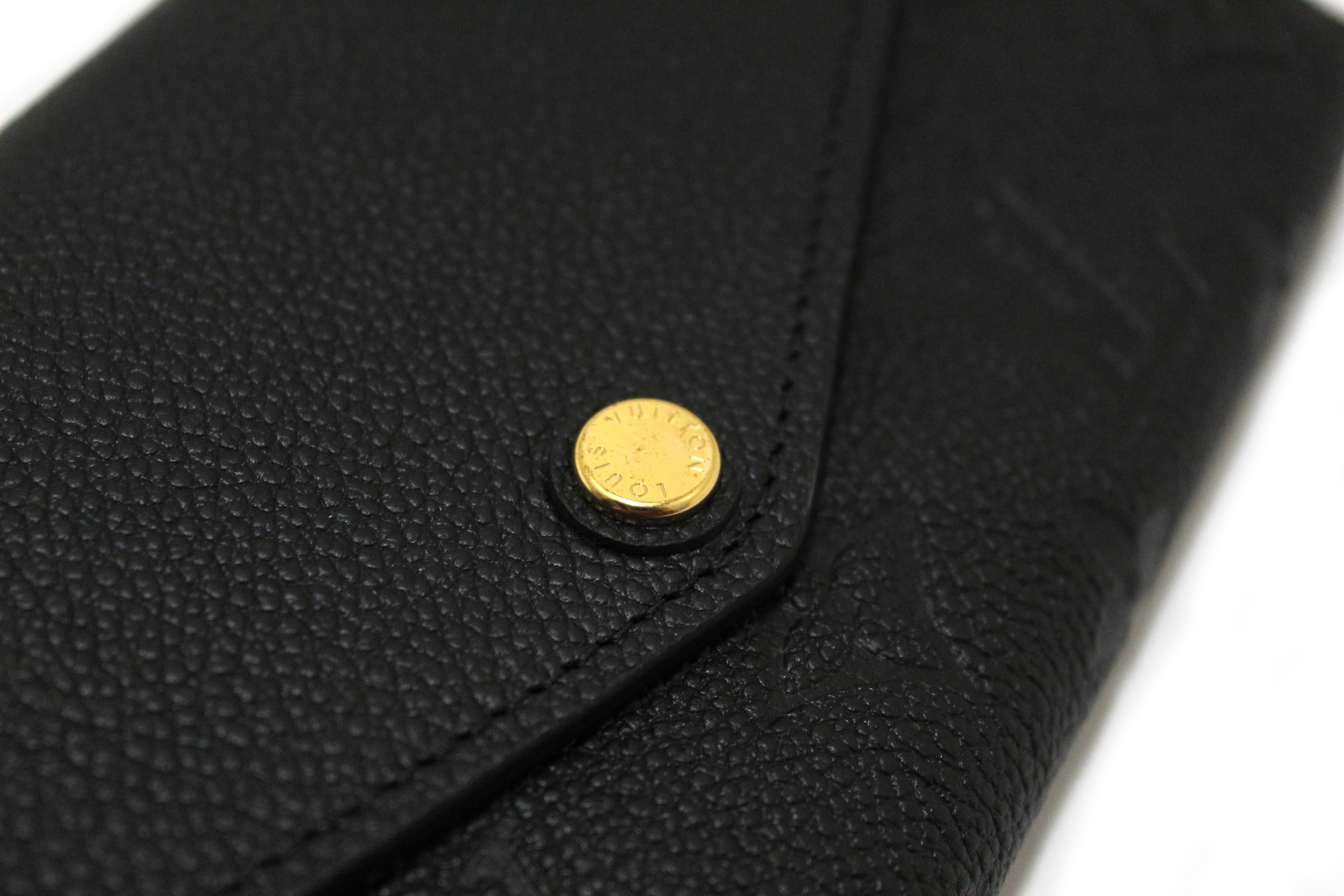 Authentic Louis Vuitton Black Monogram Empreinte Leather Sarah Wallet