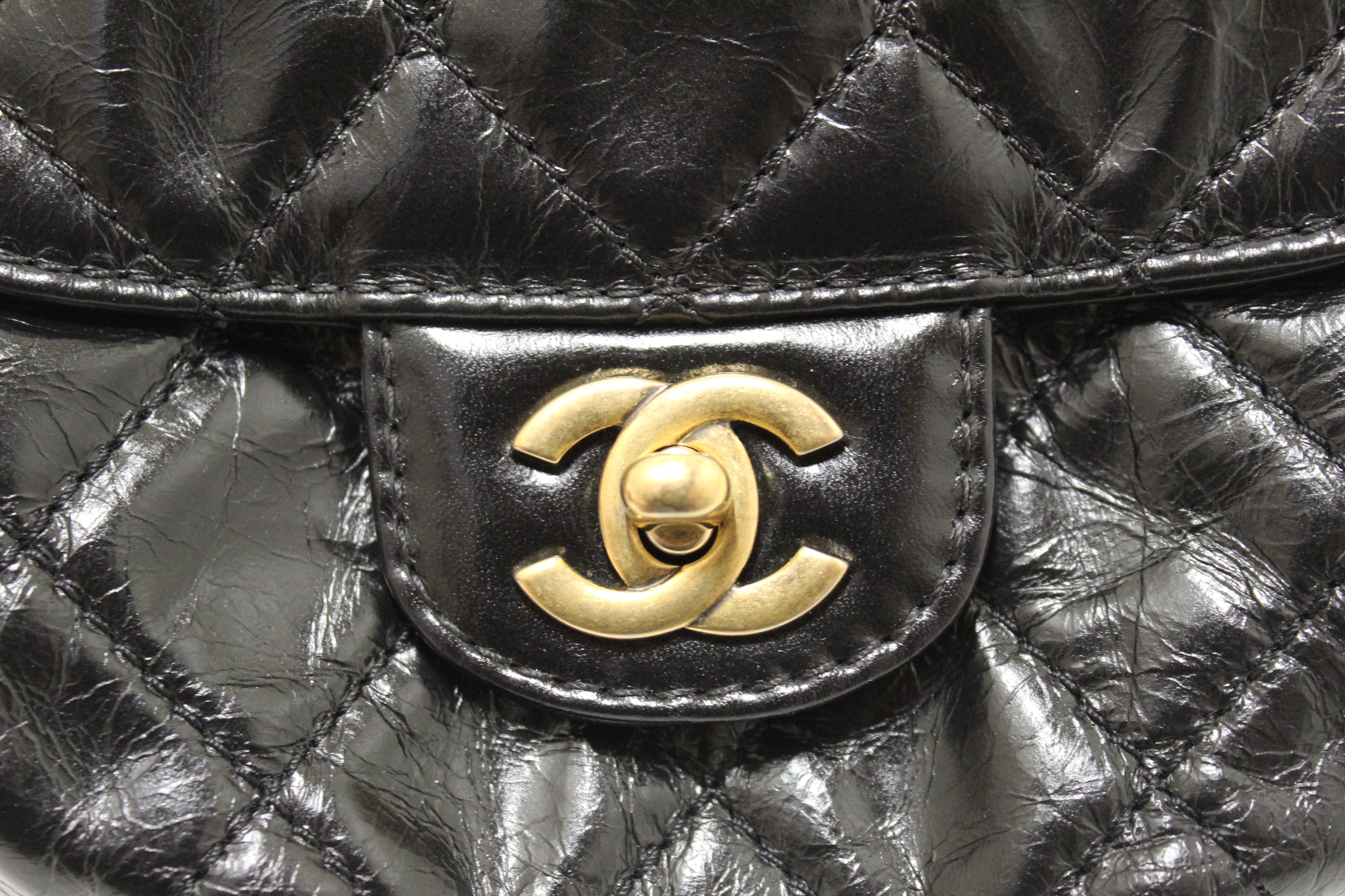 Authentic Chanel Black Aged Calfskin Quilted Mini Haft Moon Bag – Paris  Station Shop