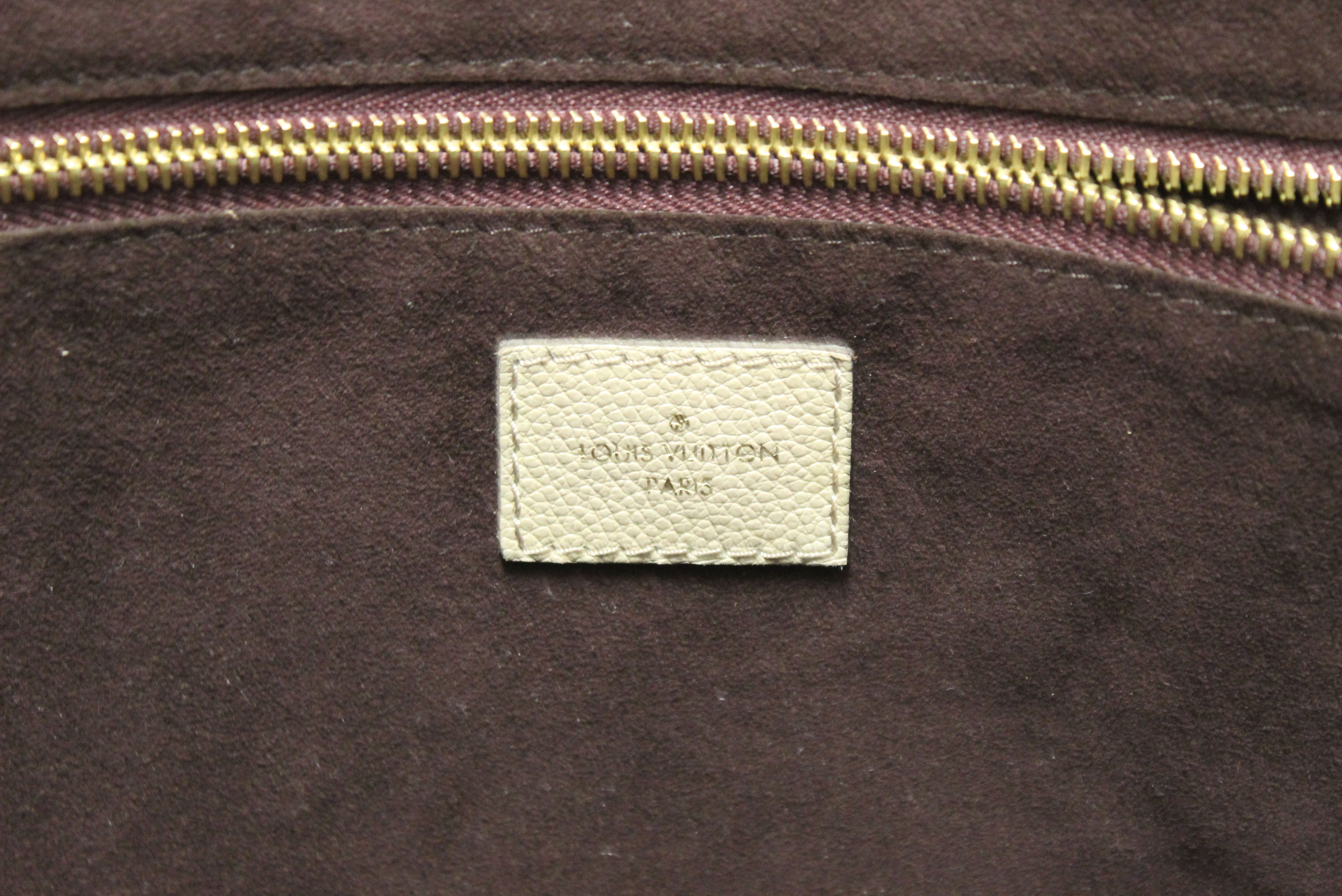 Authentic Louis Vuitton Turtledove Monogram Empreinte Leather Neverful ...