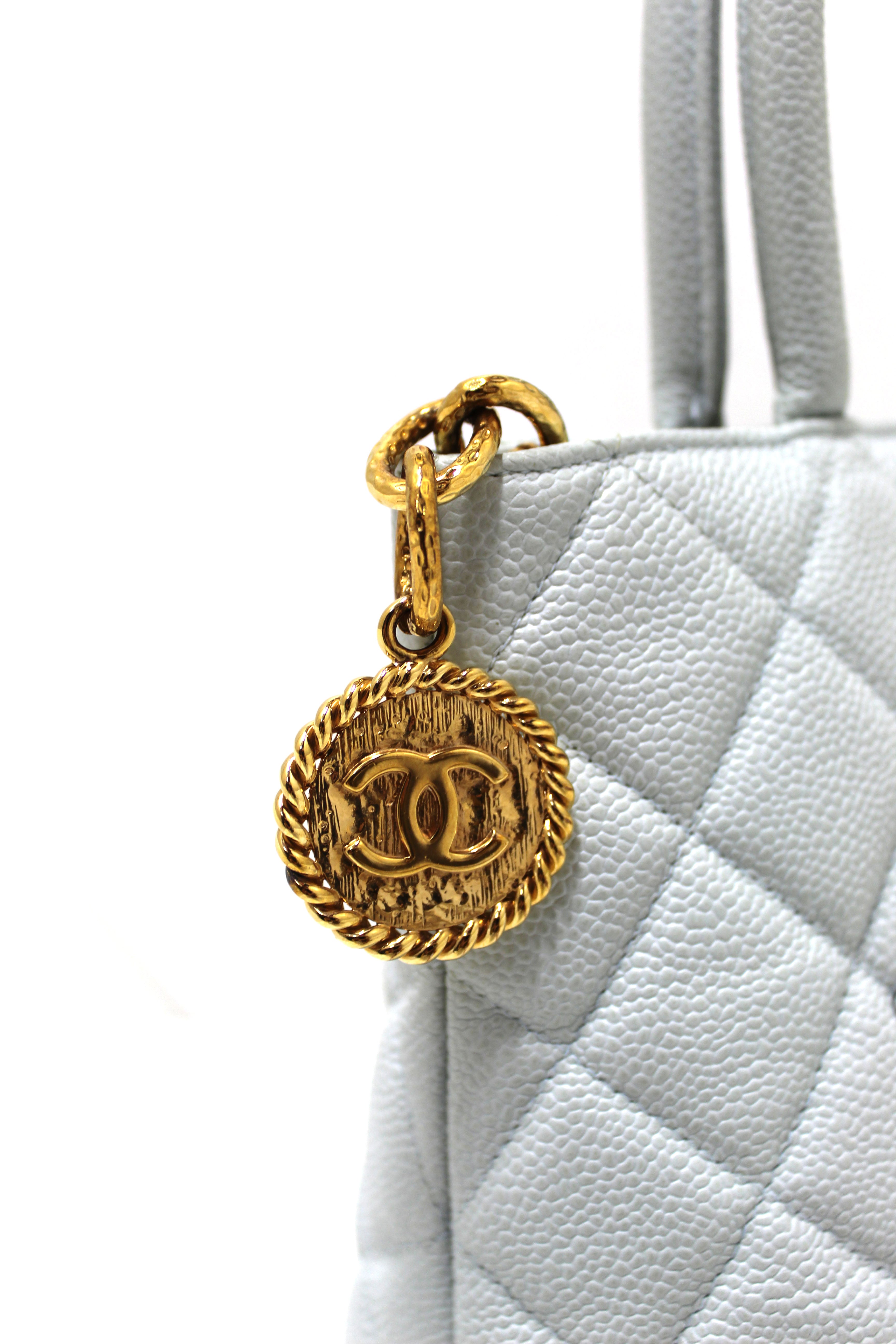 Authentic Chanel Light Blue Caviar Leather Medallion Shoulder Tote Bag