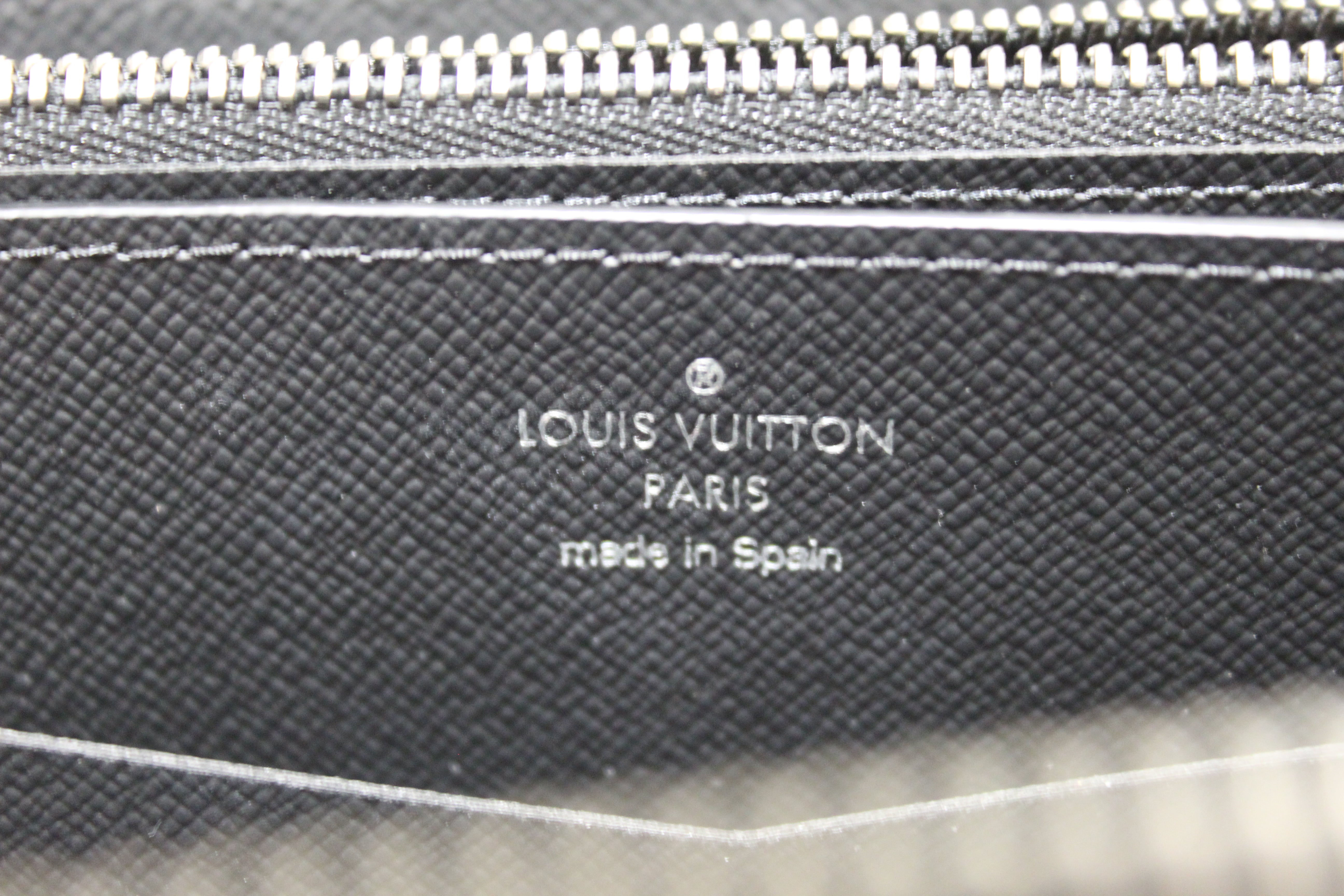 LOUIS VUITTON Monogram Eclipse Vertical Zippy Wallet 1279751
